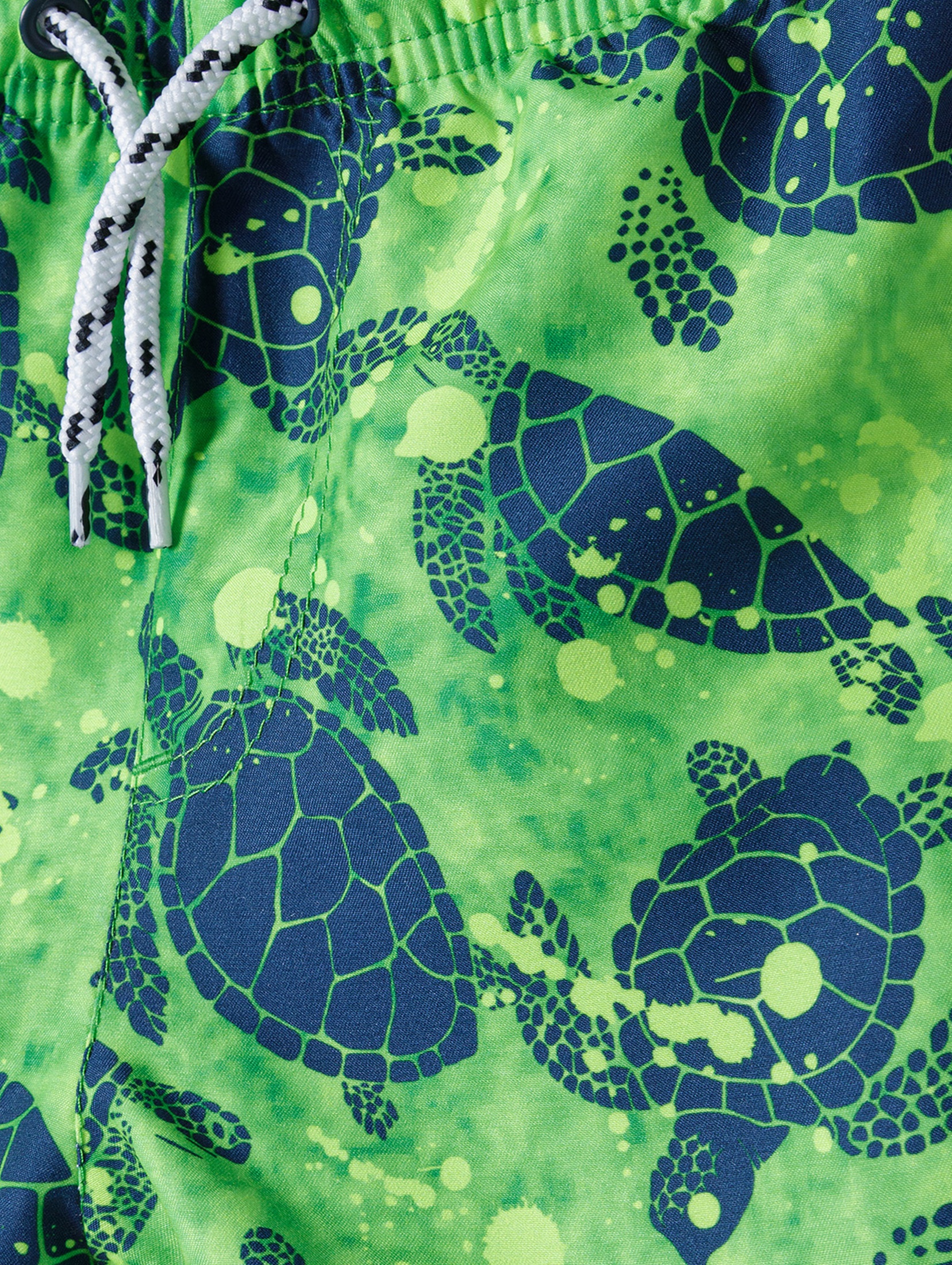 Zielone szorty kąpielowe dla chłopca w żółwie