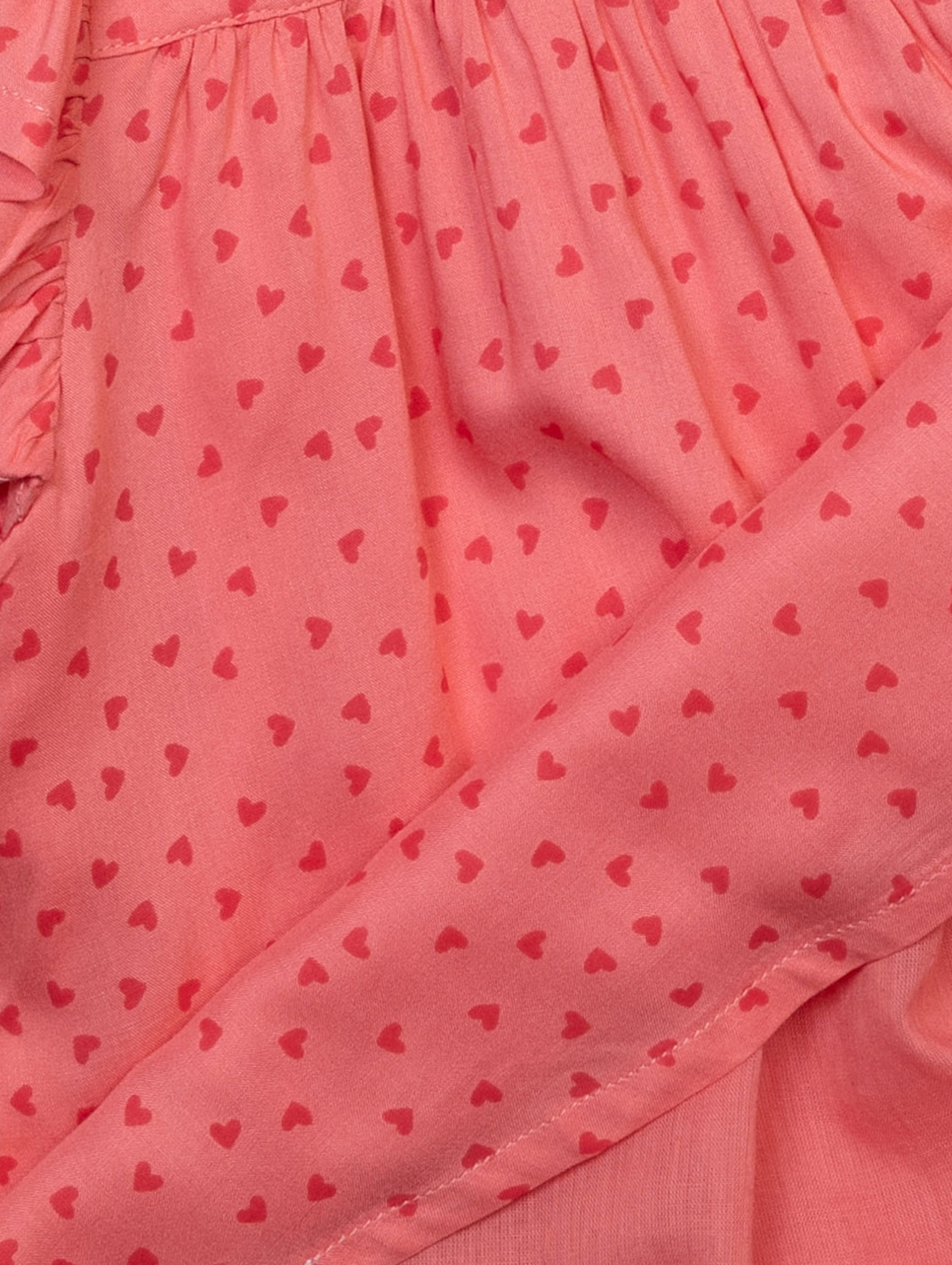 Różowa bluzka z falbankami dla niemowlaka w serduszka
