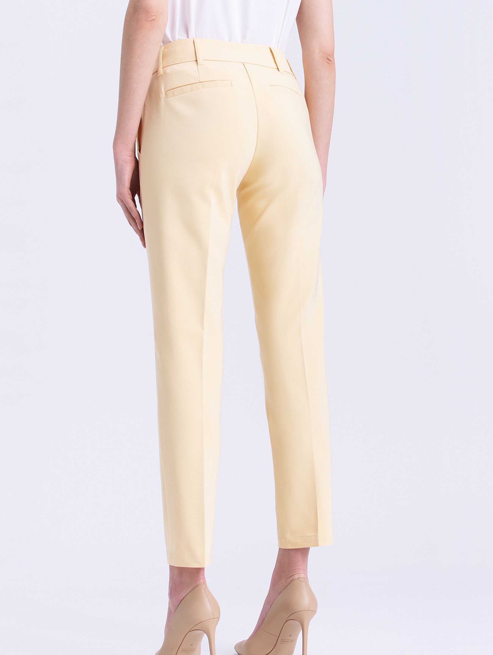 Eleganckie spodnie damskie z kantką żółte