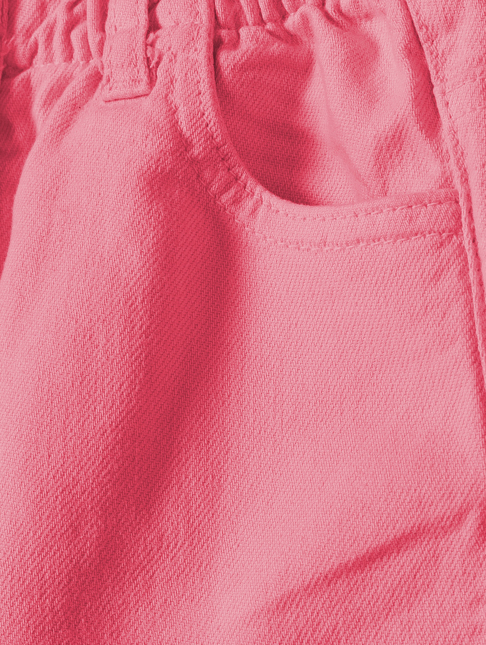 Różowe krótkie spodenki tkaninowe dla niemowlaka