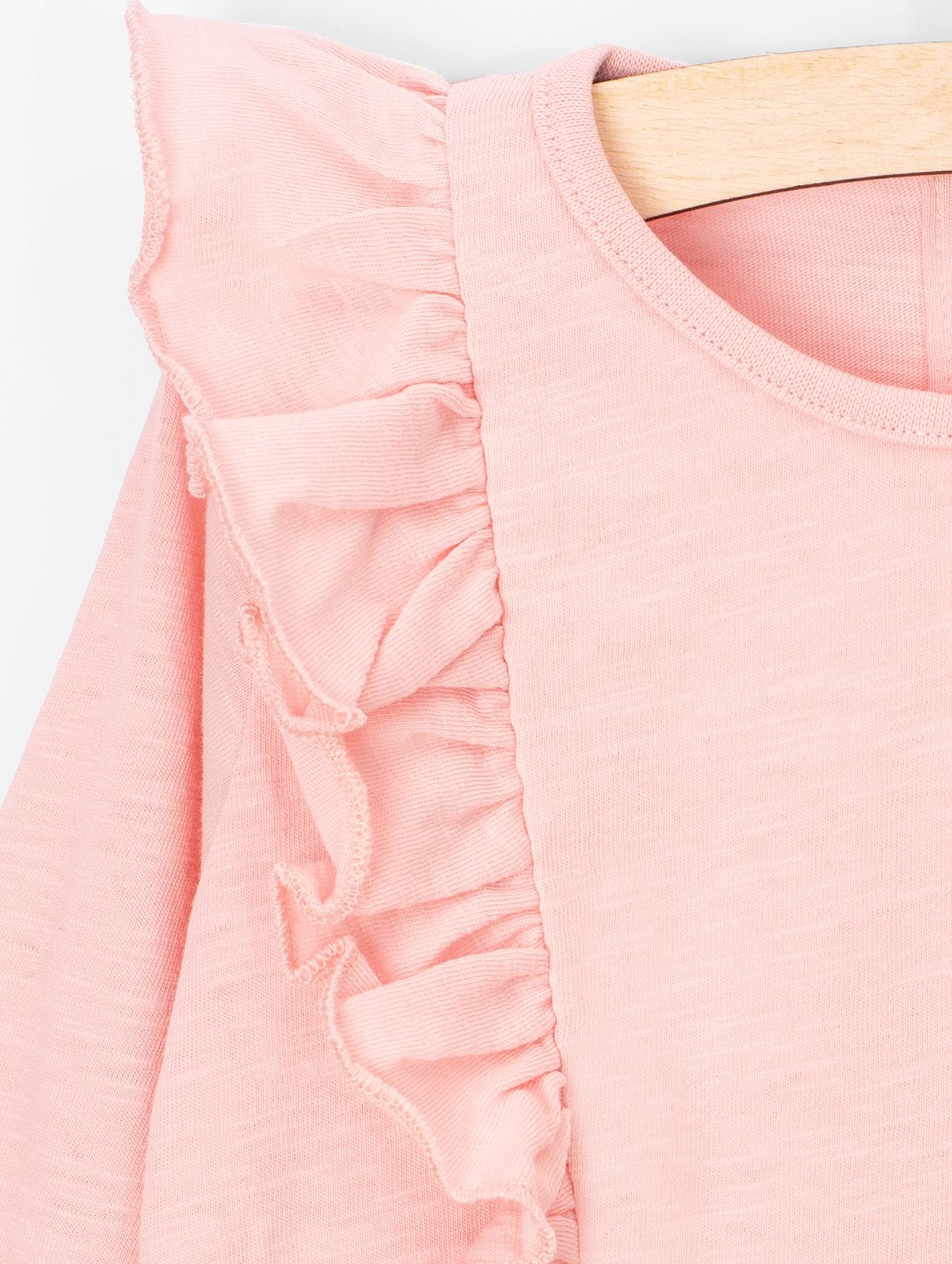 Bluzka niemowlęca różowa z ozdobną falbanką przy rękawach