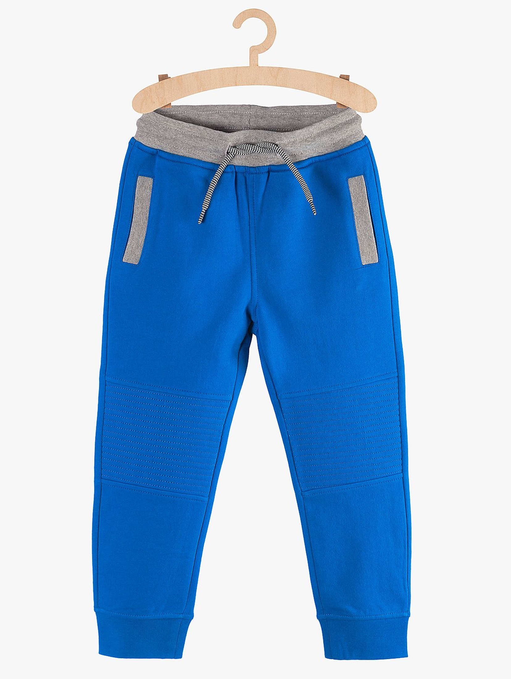 Spodnie chłopięce dresowe- niebieskie z kieszeniami