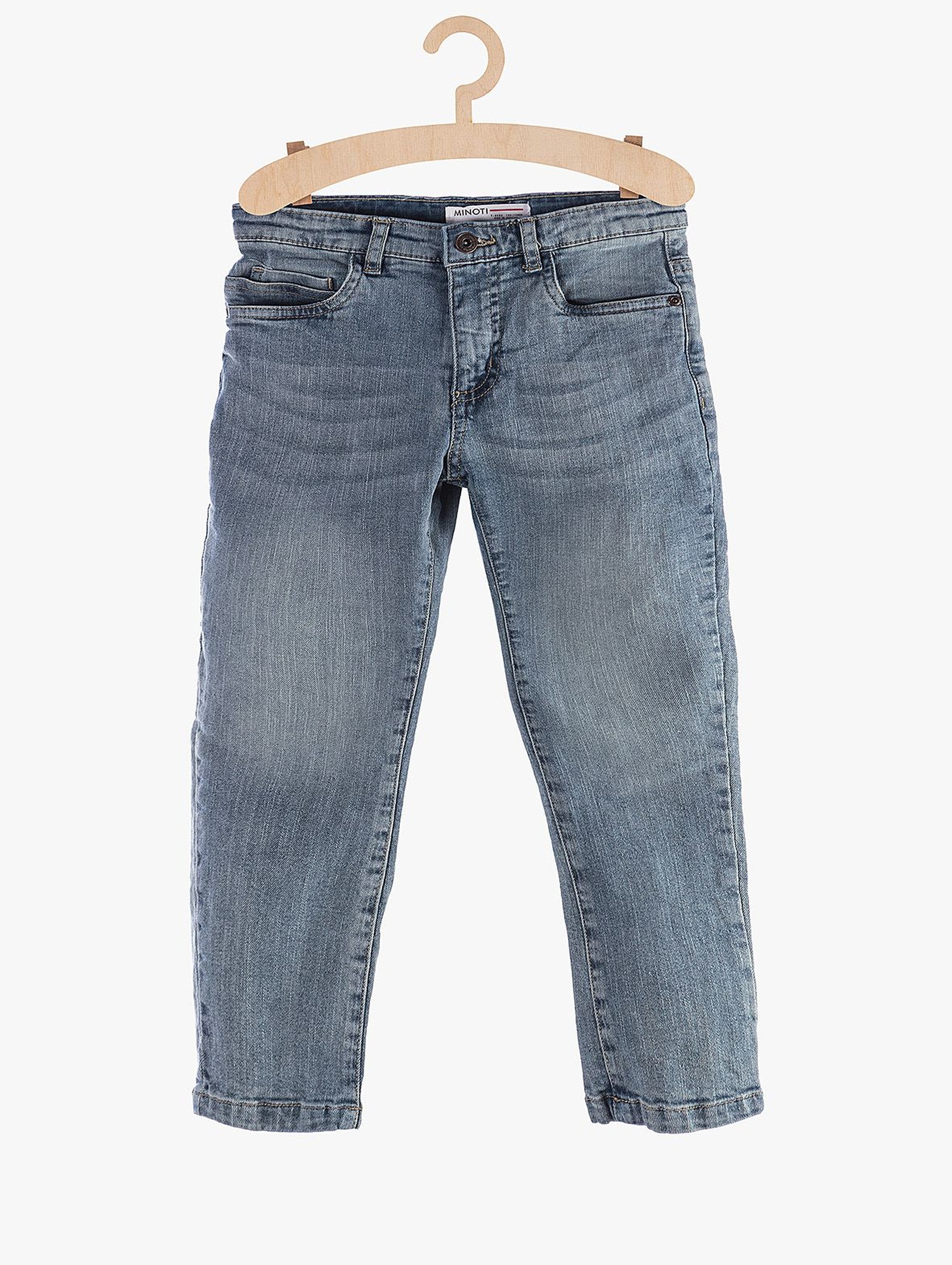 Jeansowe spodnie chłopięce z przetarciami
