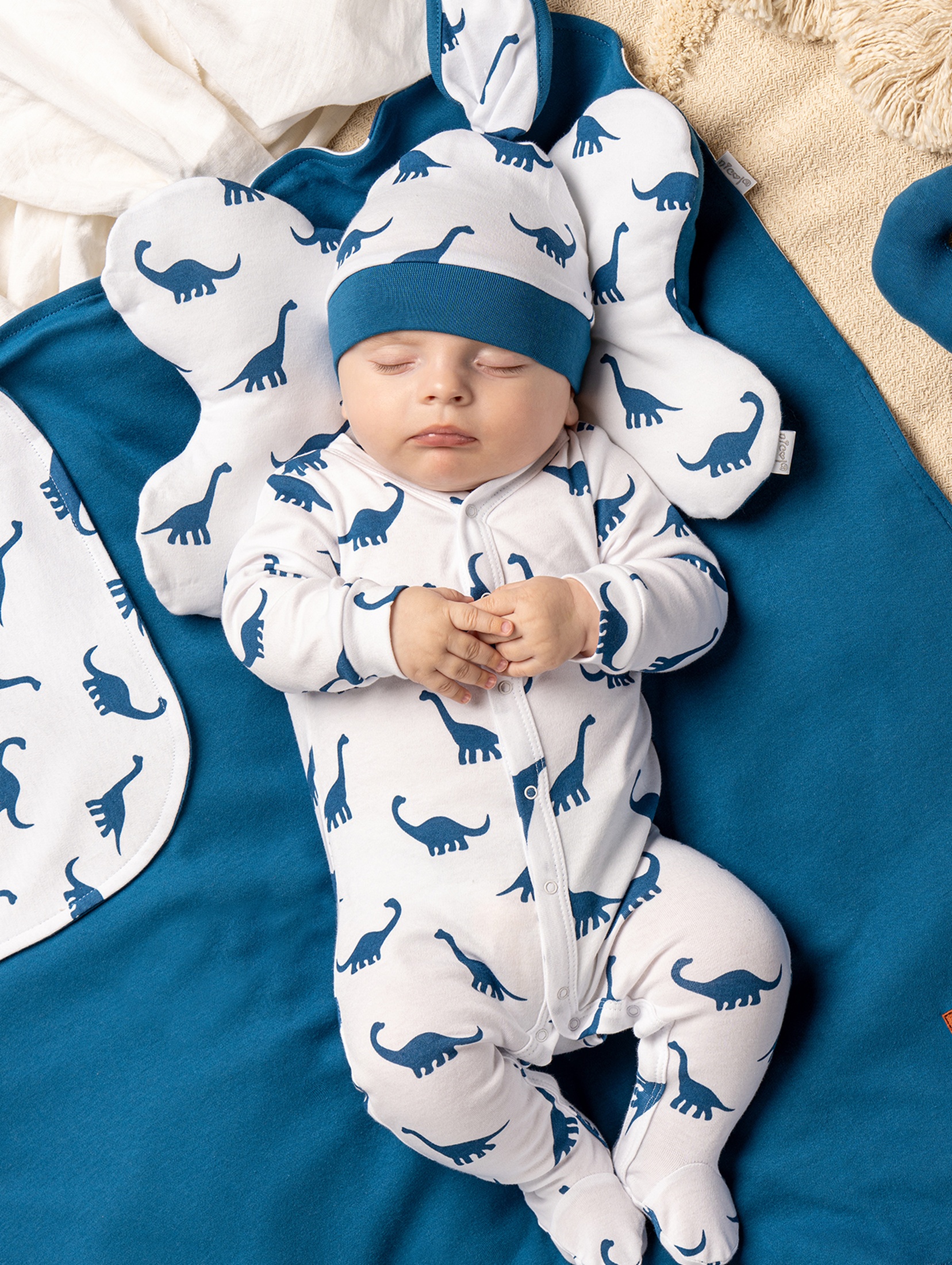 Bawełniana dziecięca poduszka/ motylek - niebieskie dinozaury