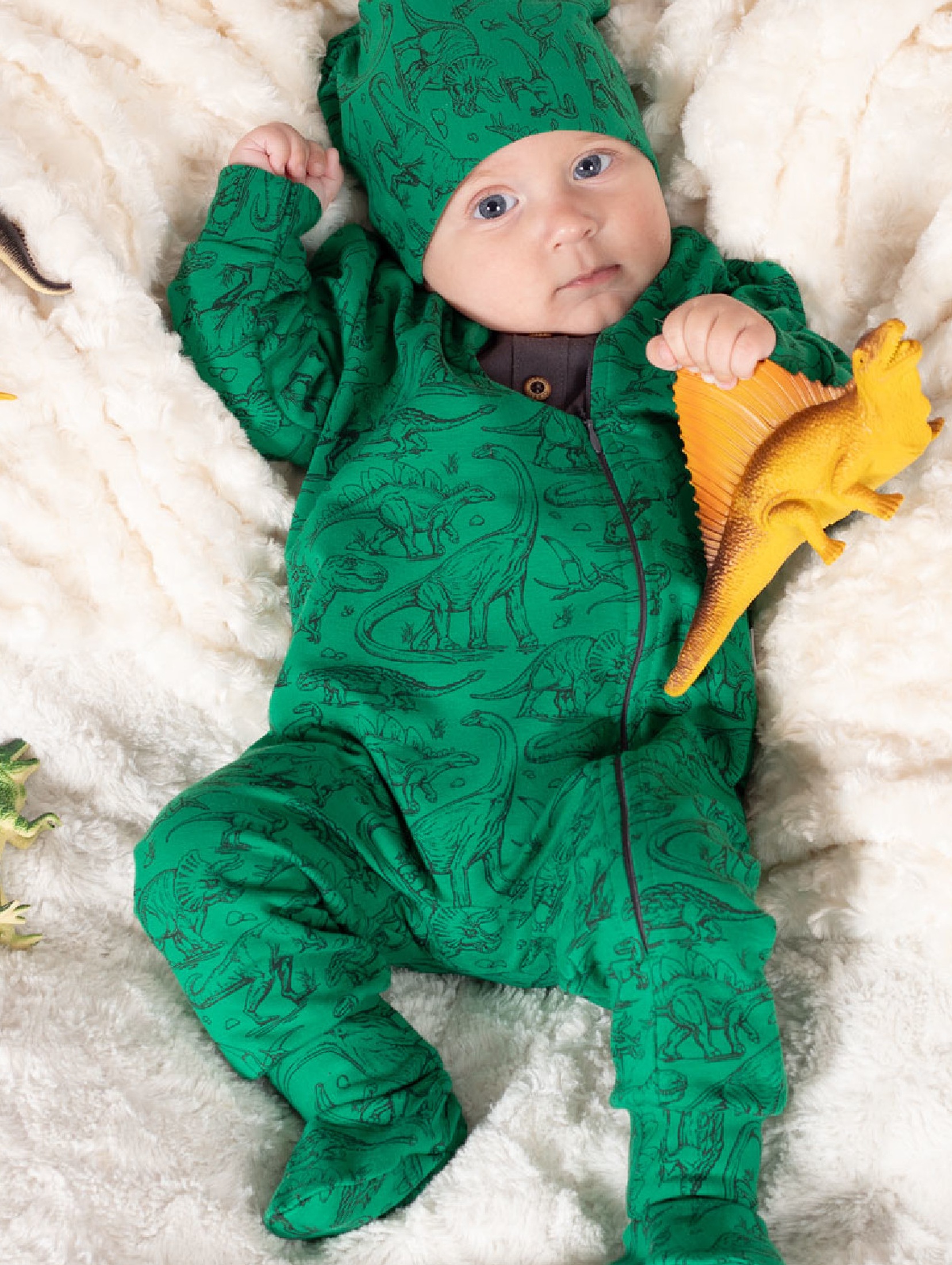 Dzianinowy pajac niemowlęcy dresowy zielony w dinozaury