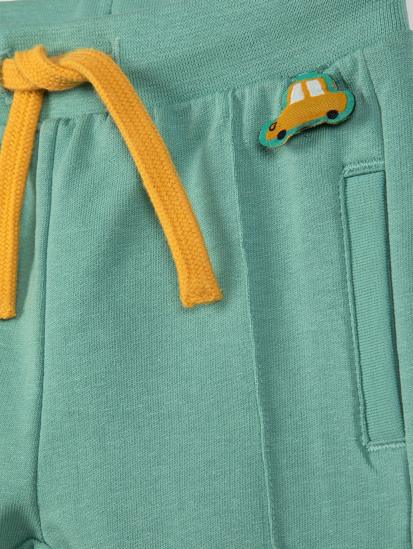Bawełniane spodnie niemowlęce z elementem 3D - zielone