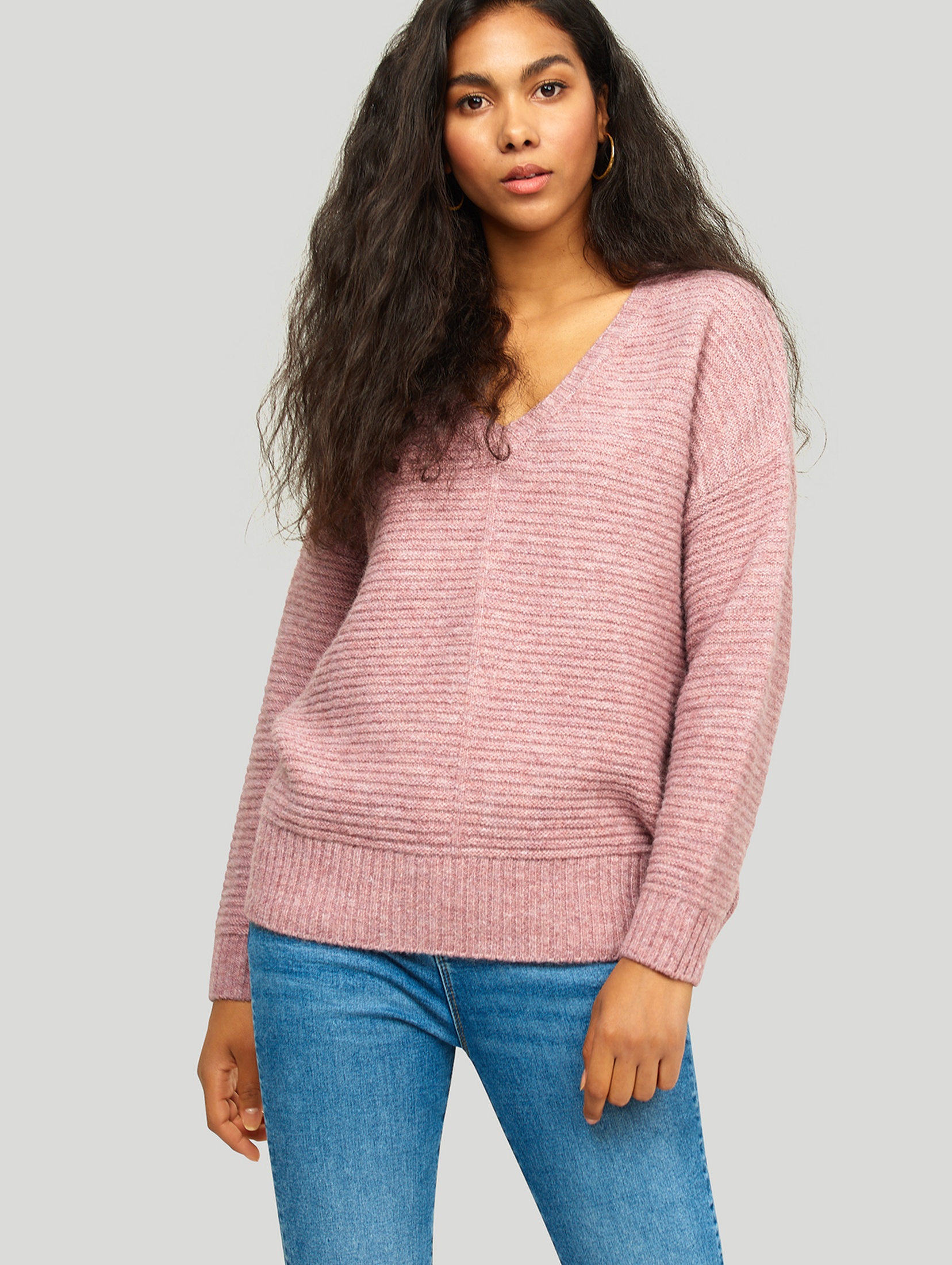 Nierozpinany sweter damski różowy