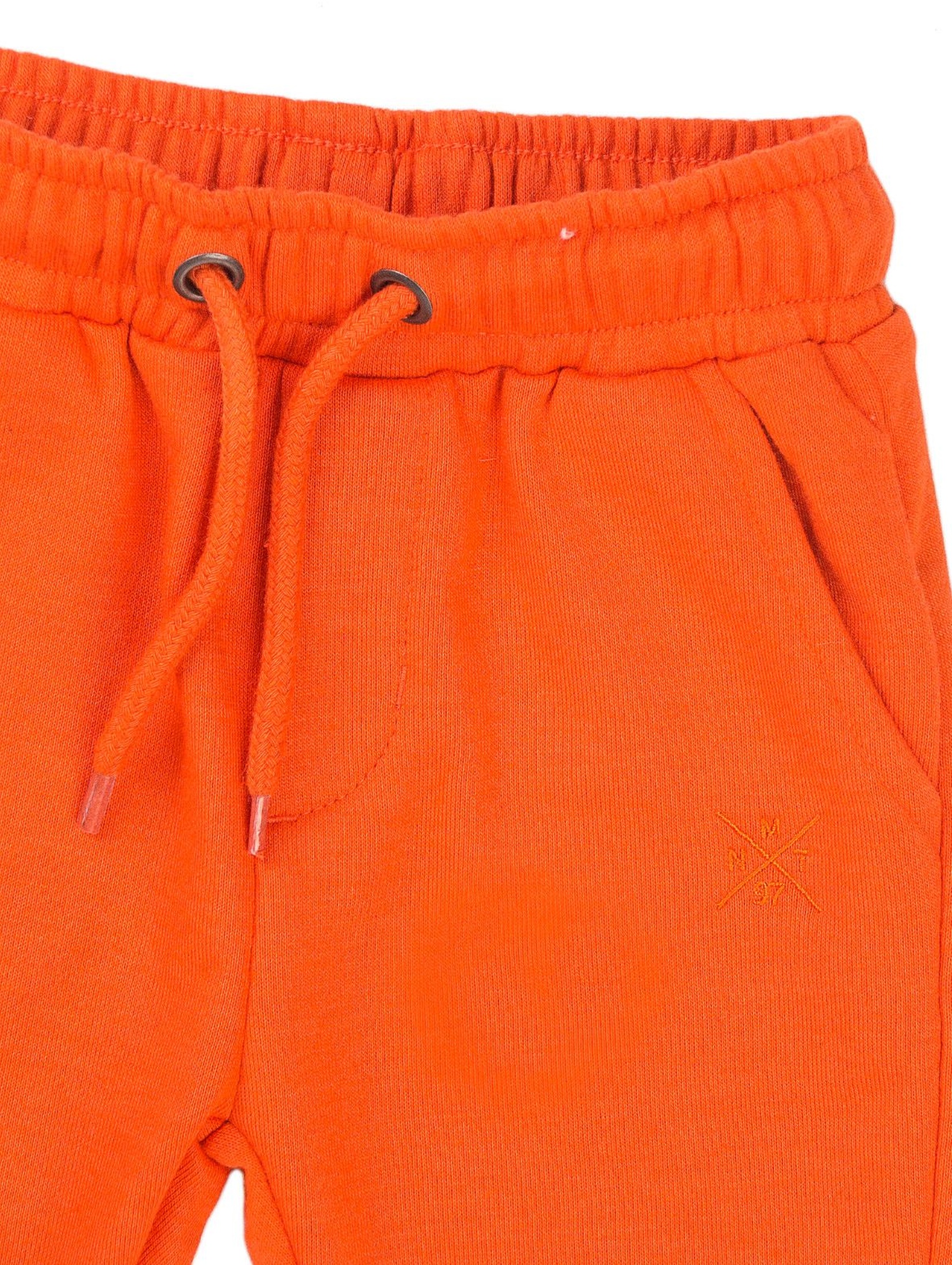 Spodnie dresowe chłopięce pomarańczowe