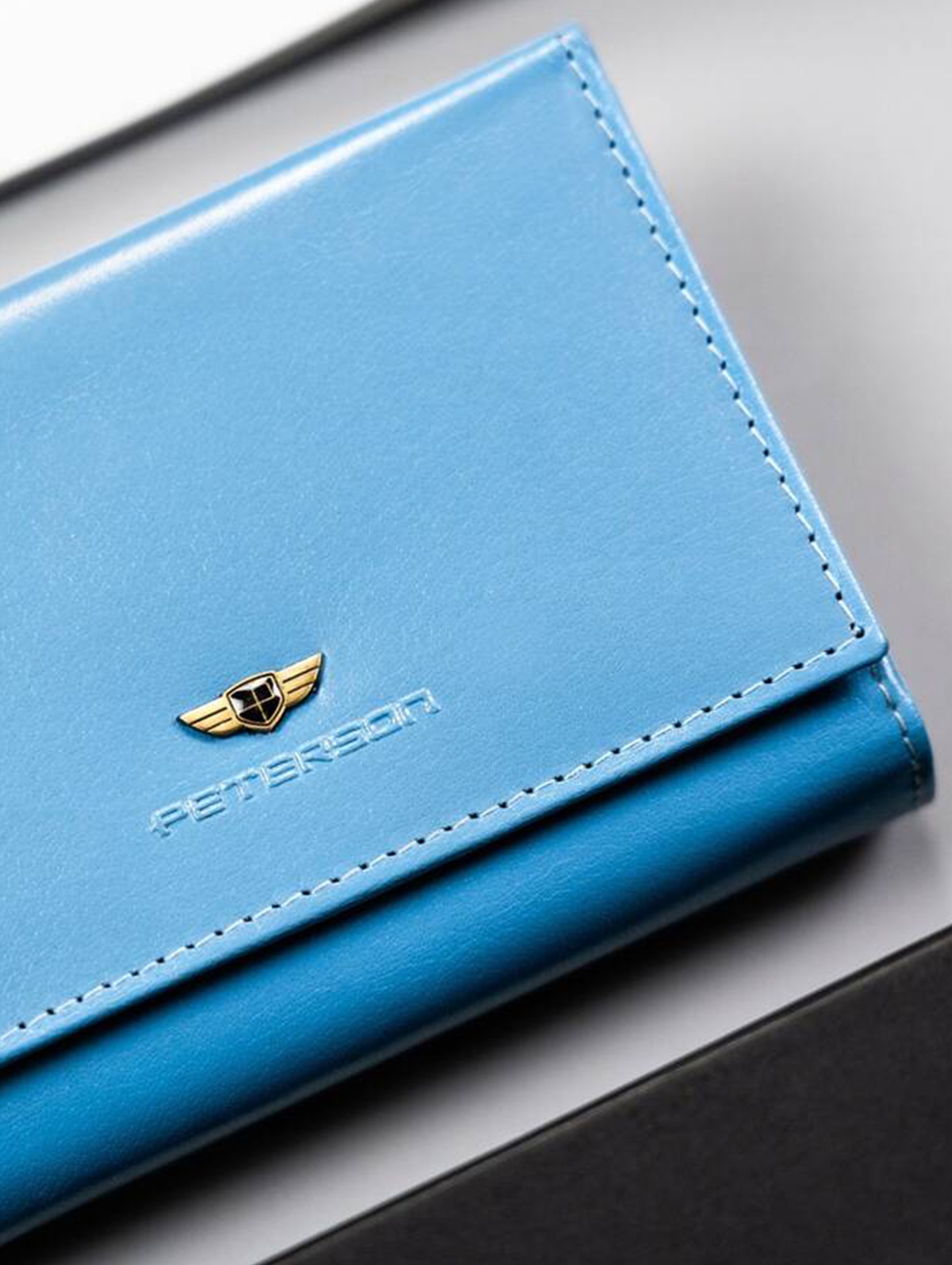 Elegancki portfel damski ze skóry naturalnej — Peterson niebieski
