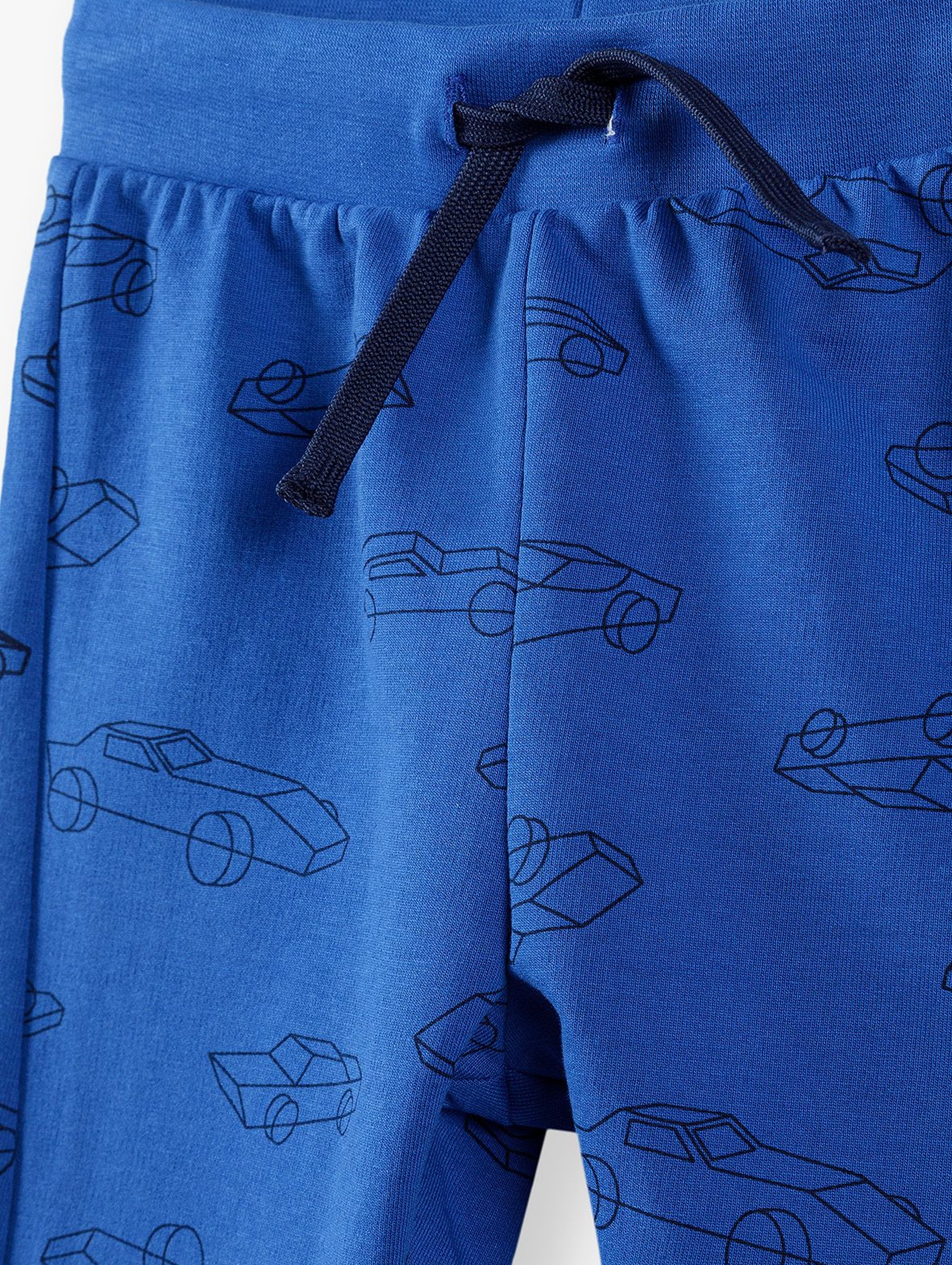 Bawełniane spodnie dresowe niebieskie w autka