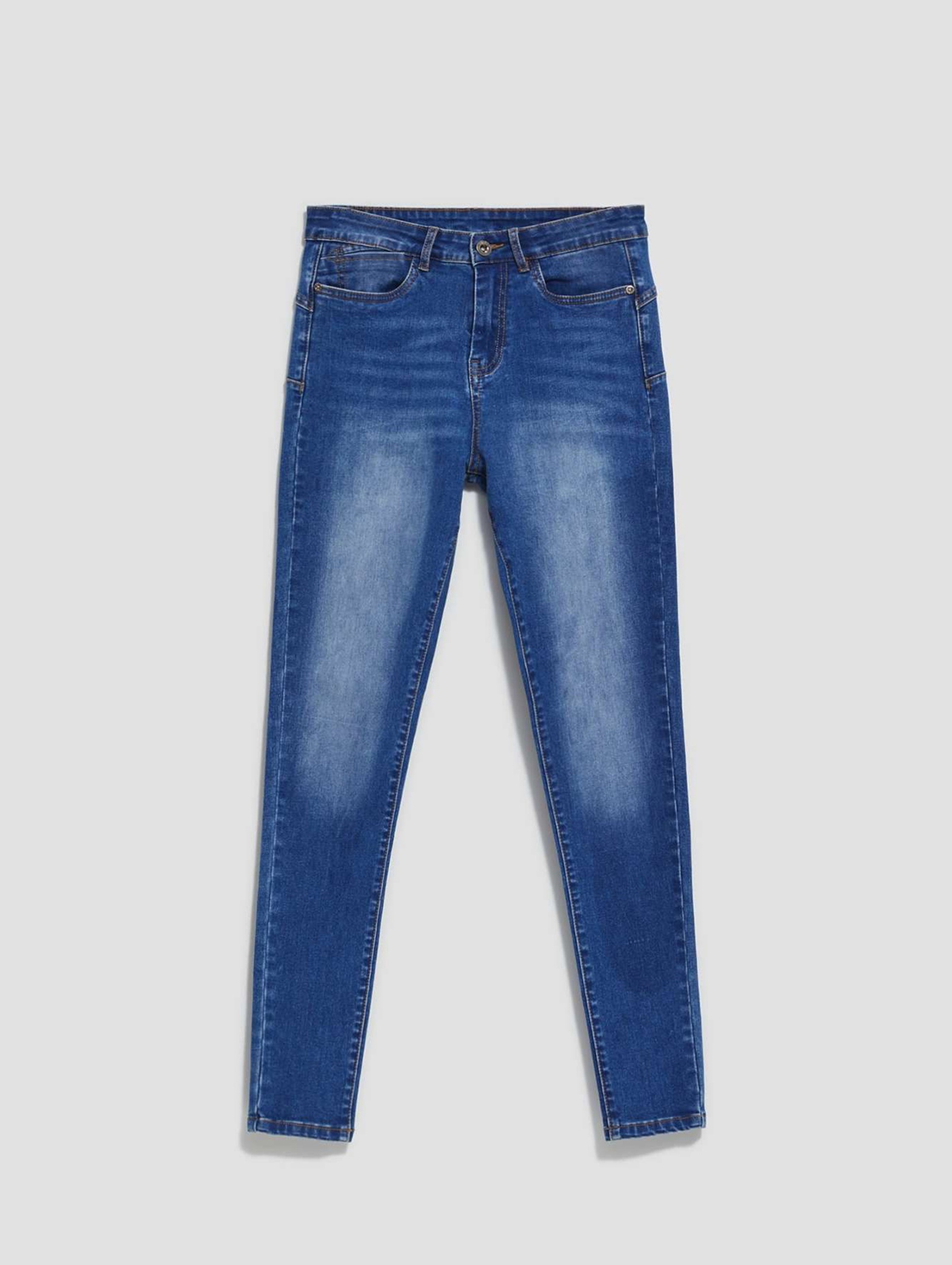 Niebieskie spodnie damskie jeansowe skinny
