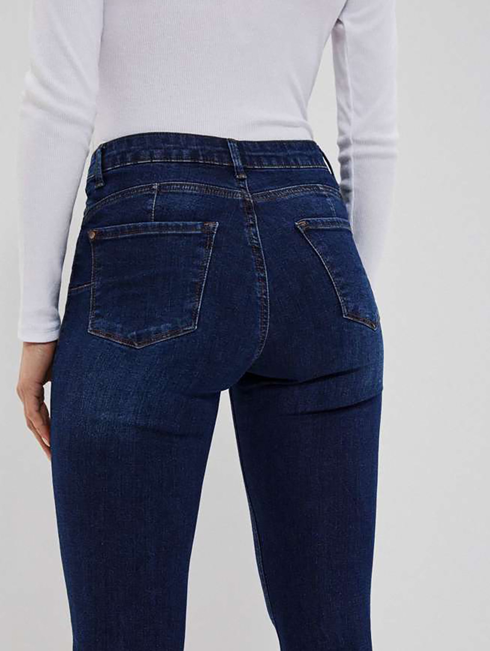 Granatowe spodnie jeansowe damskie push up