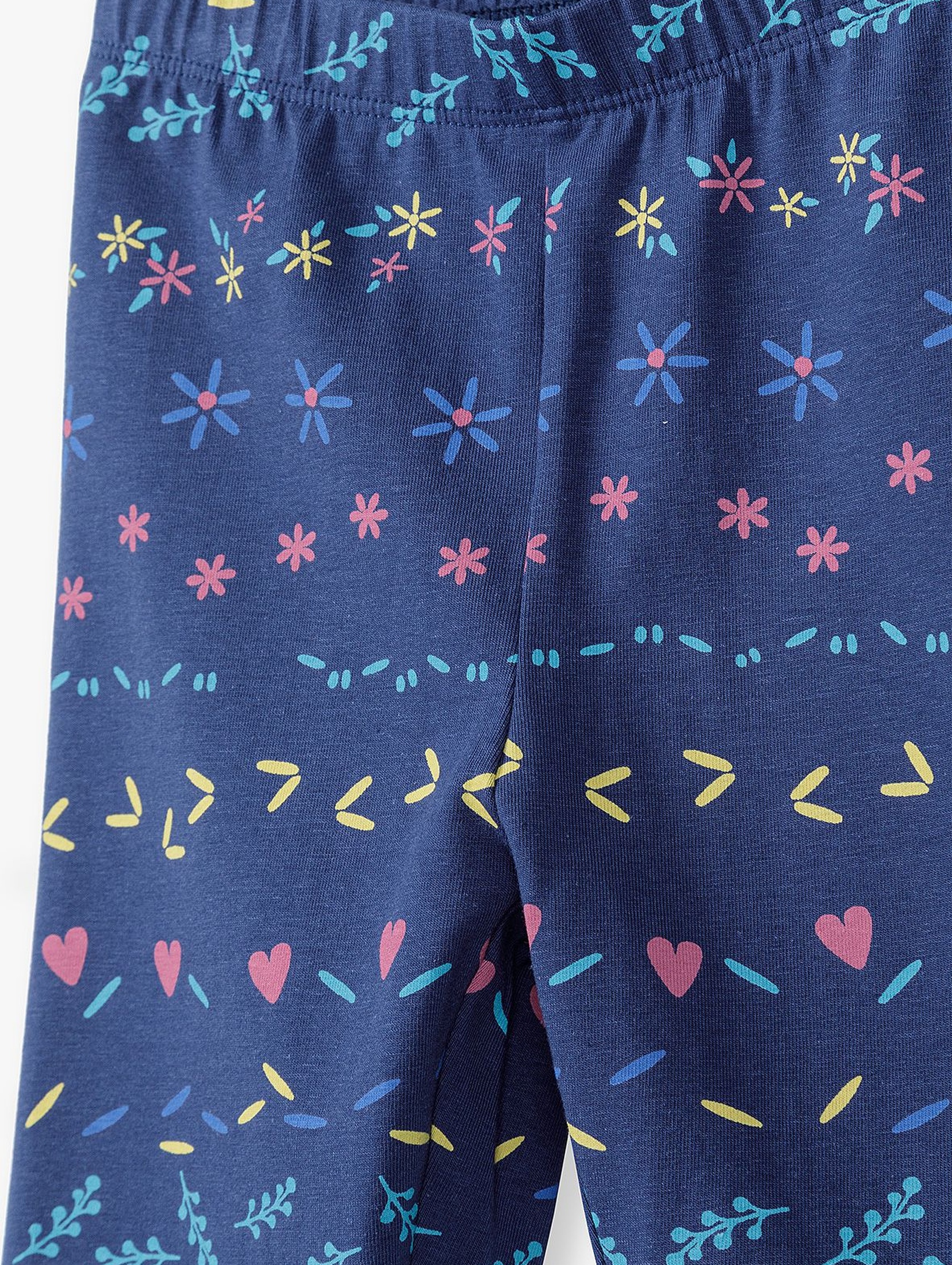 Granatowe legginsy dziewczęce w kolorowe wzorki