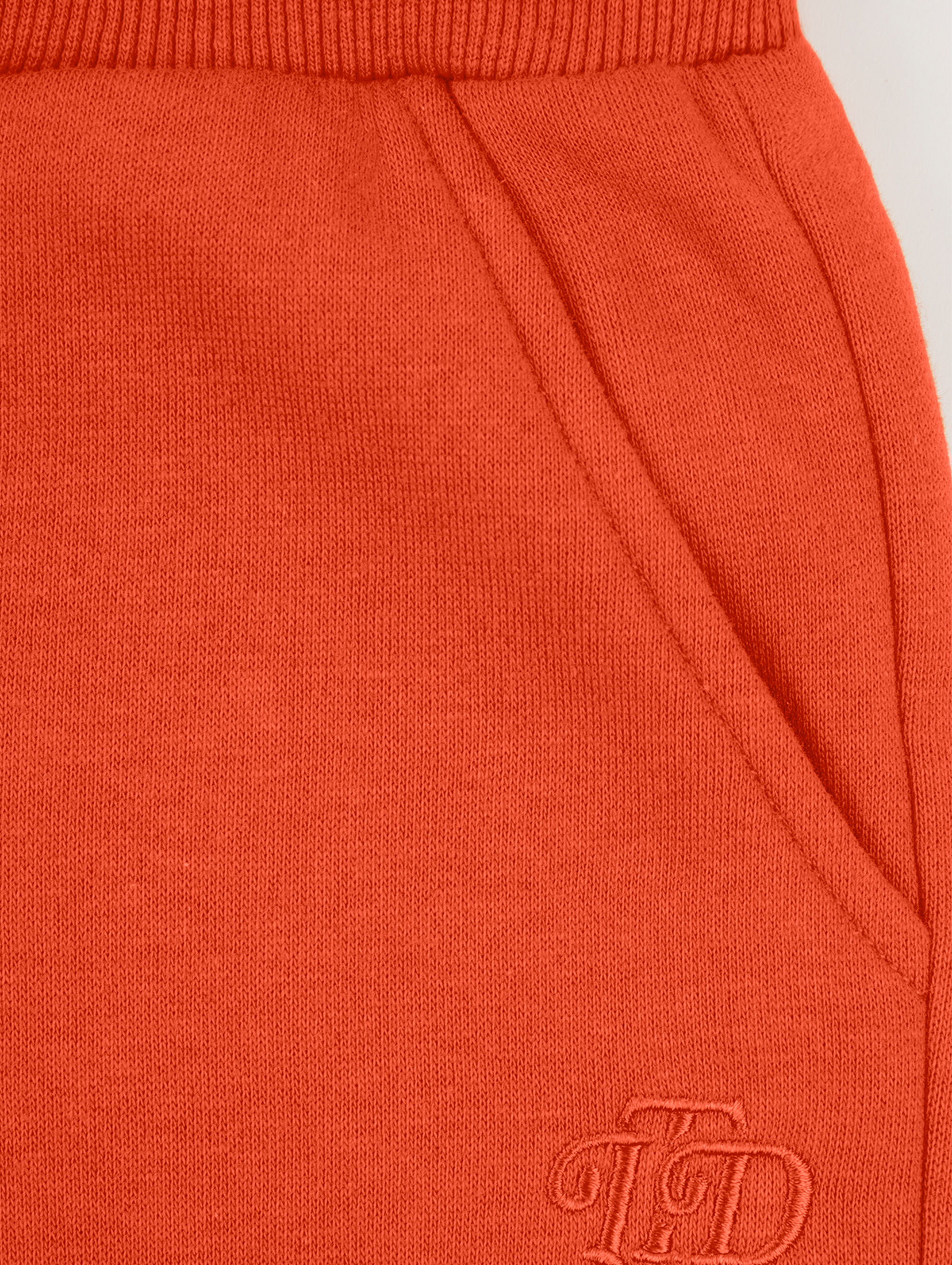Pomarańczowe spodnie dresowe - unisex - Limited Edition