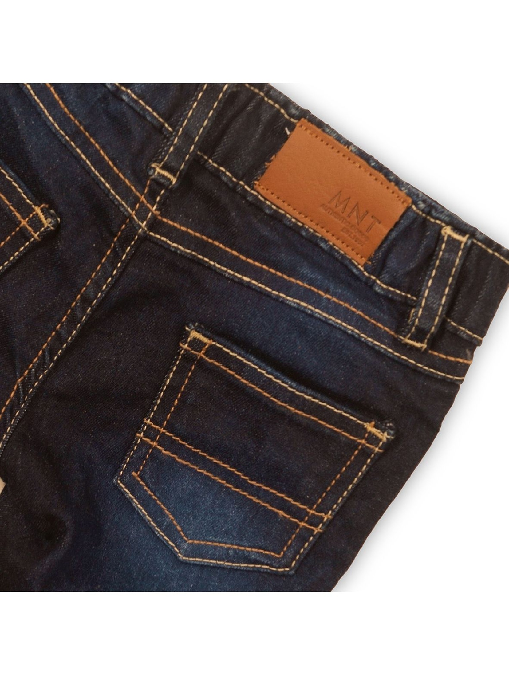 Granatowe jeansowe spodnie niemowlęce z kieszeniami