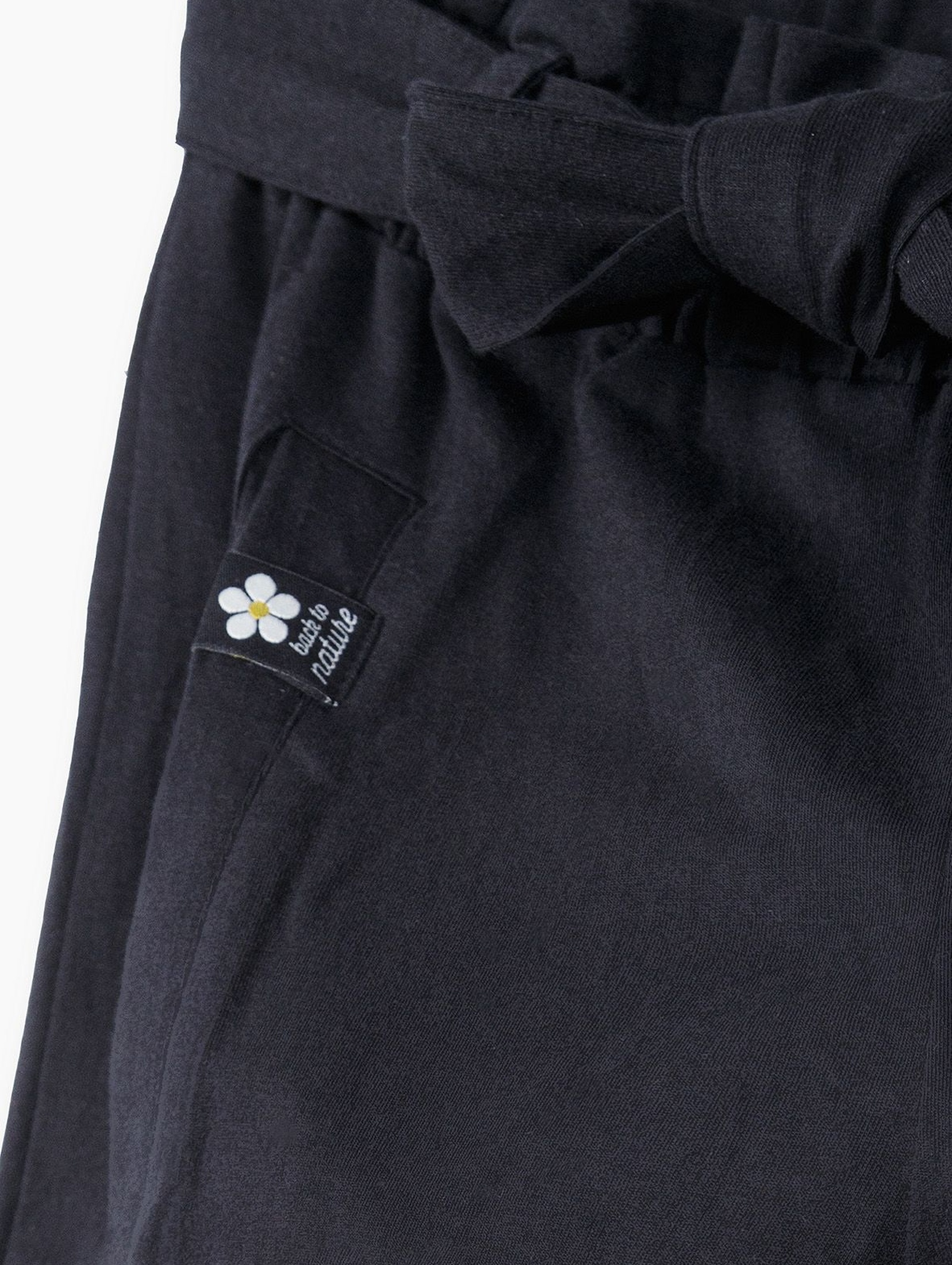 Dresowe spodnie dziewczęce z wiązaniem - czarne