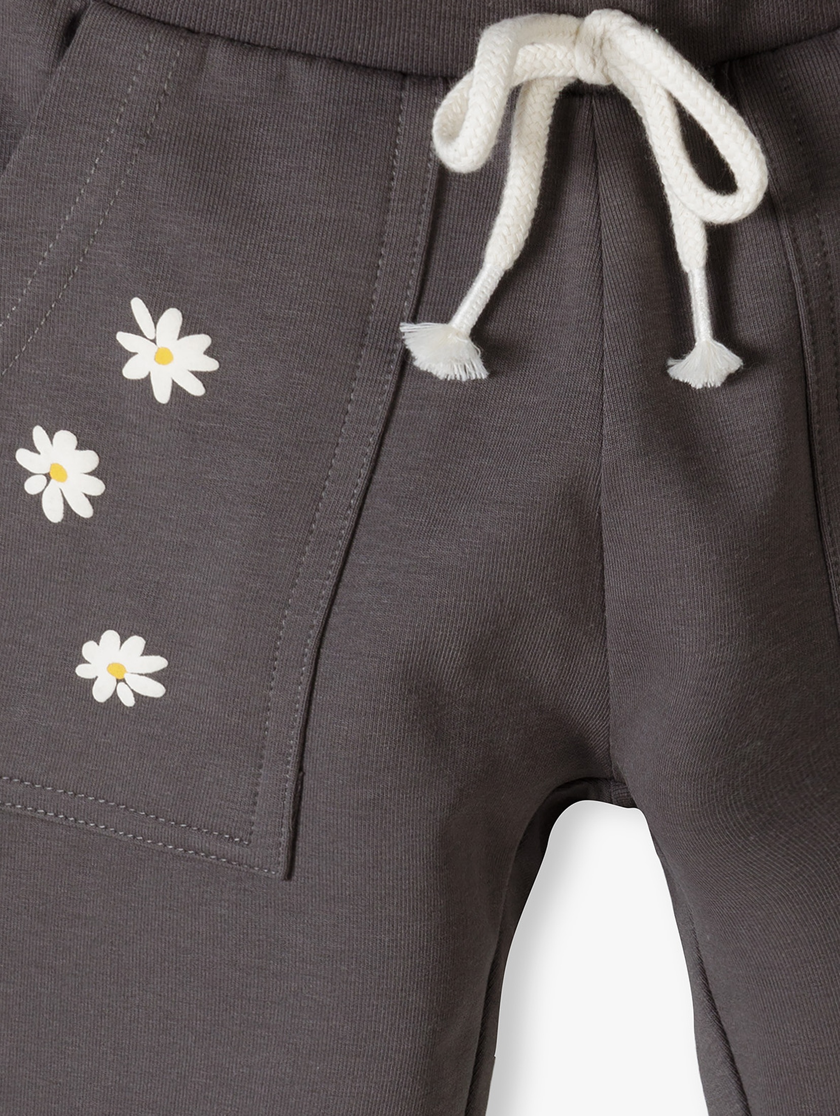 Dzianinowe spodnie dziewczęce - szare z ozdobnymi kwiatkami
