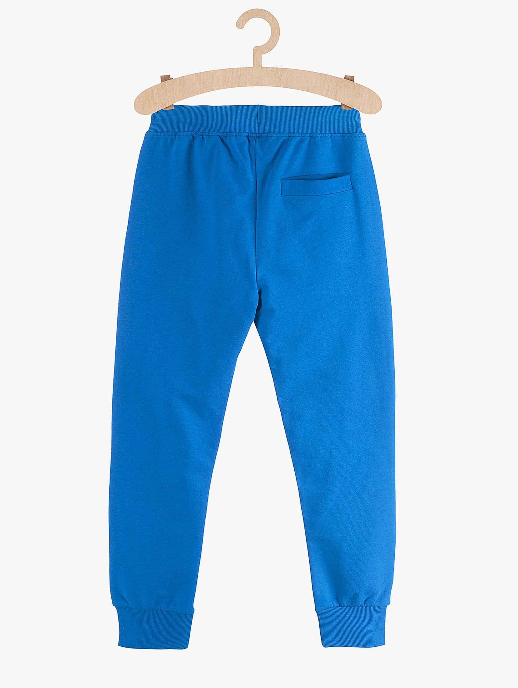 Spodnie chłopięce dresowe niebieskie z kieszeniami