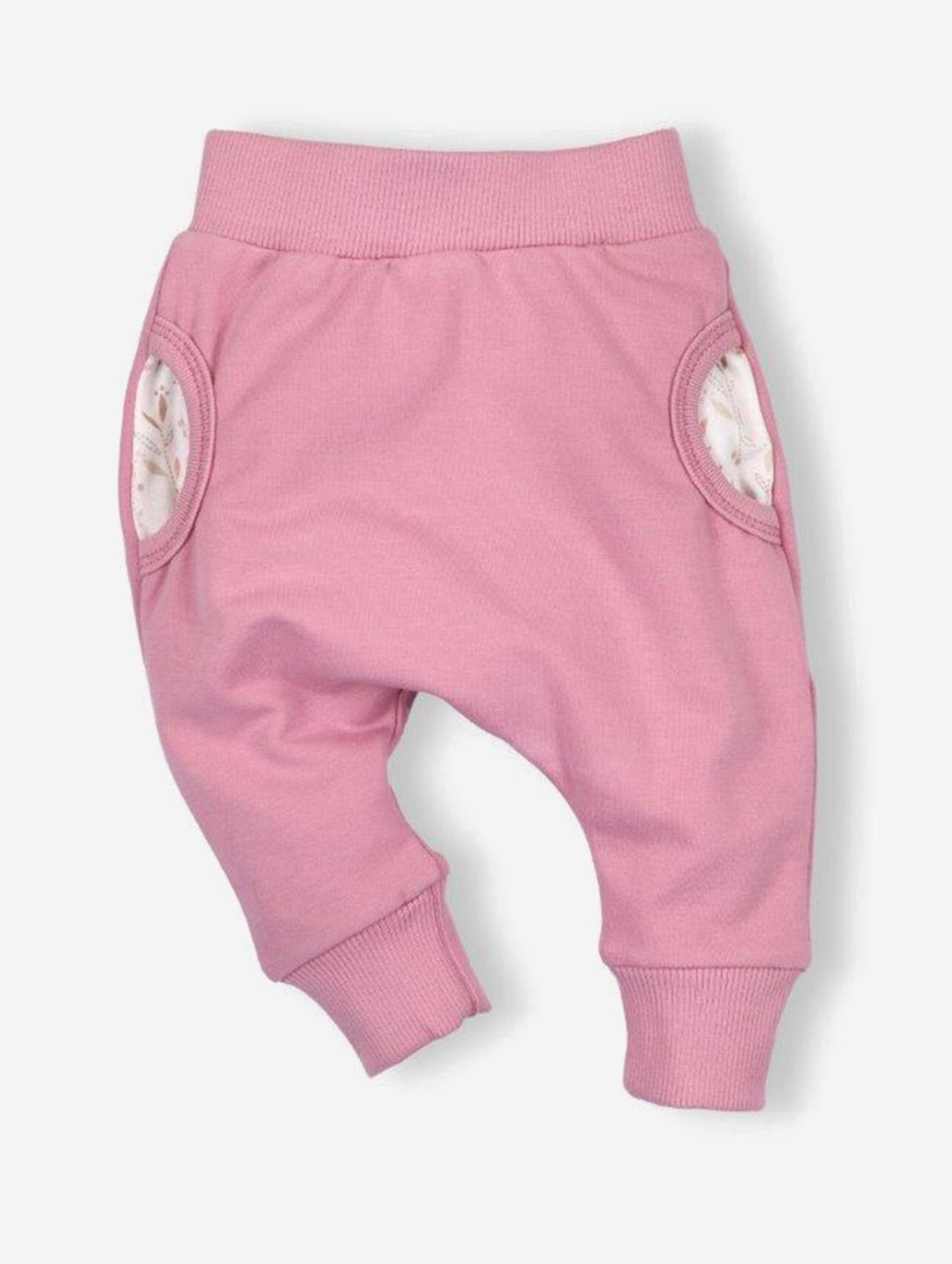 Spodnie niemowlęce z bawełny organicznej dla dziewczynki różowe