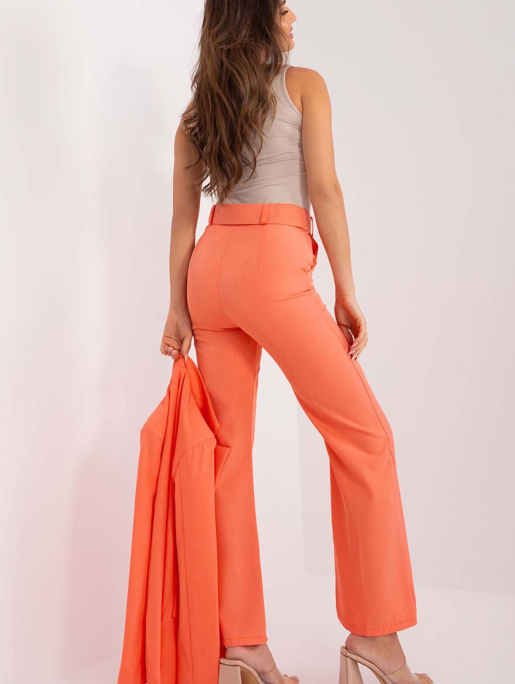 Fluo pomarańczowe spodnie garniturowe damskie z kieszeniami