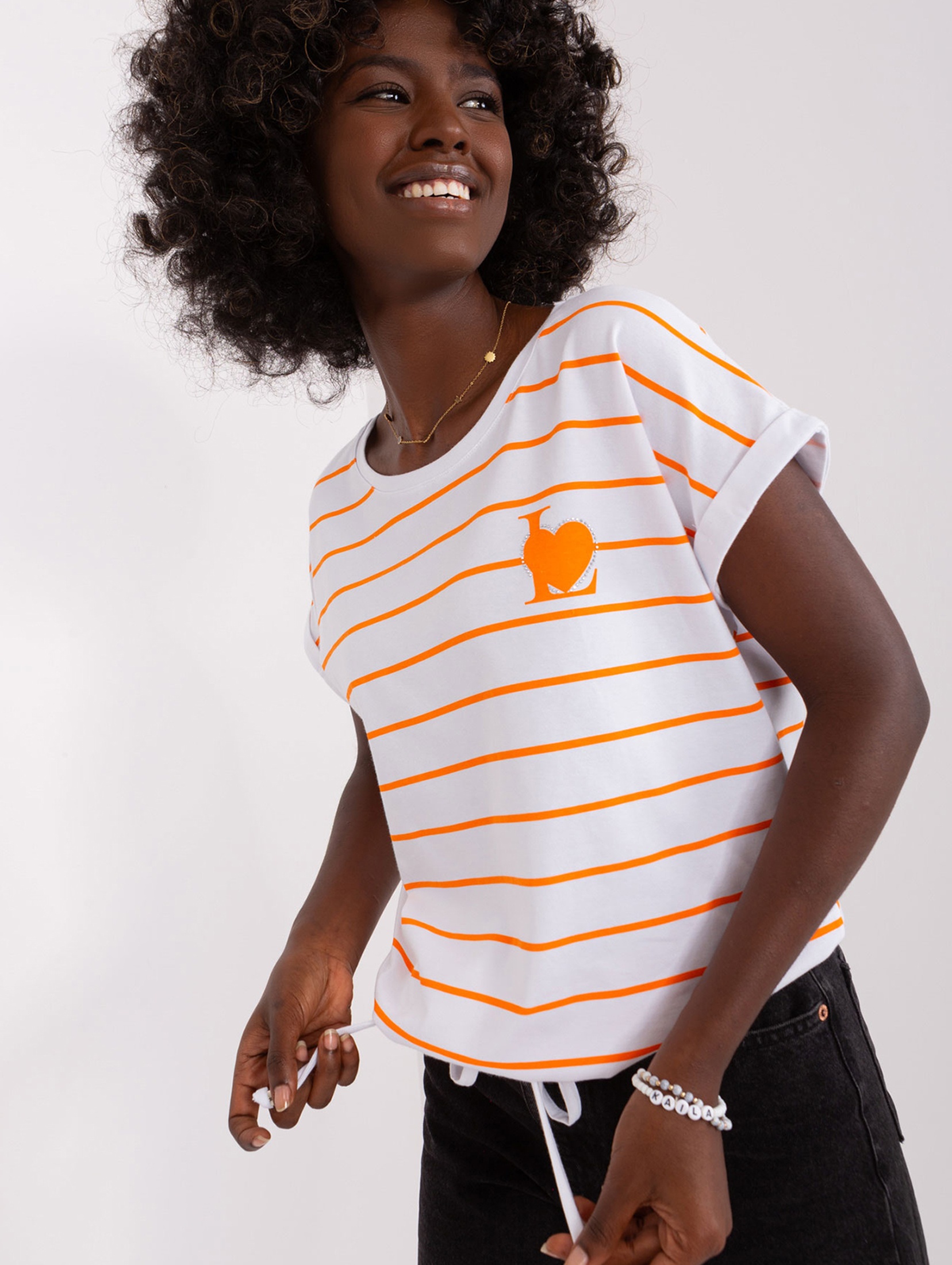 Biało-pomarańczowa bluzka w paski z aplikacją