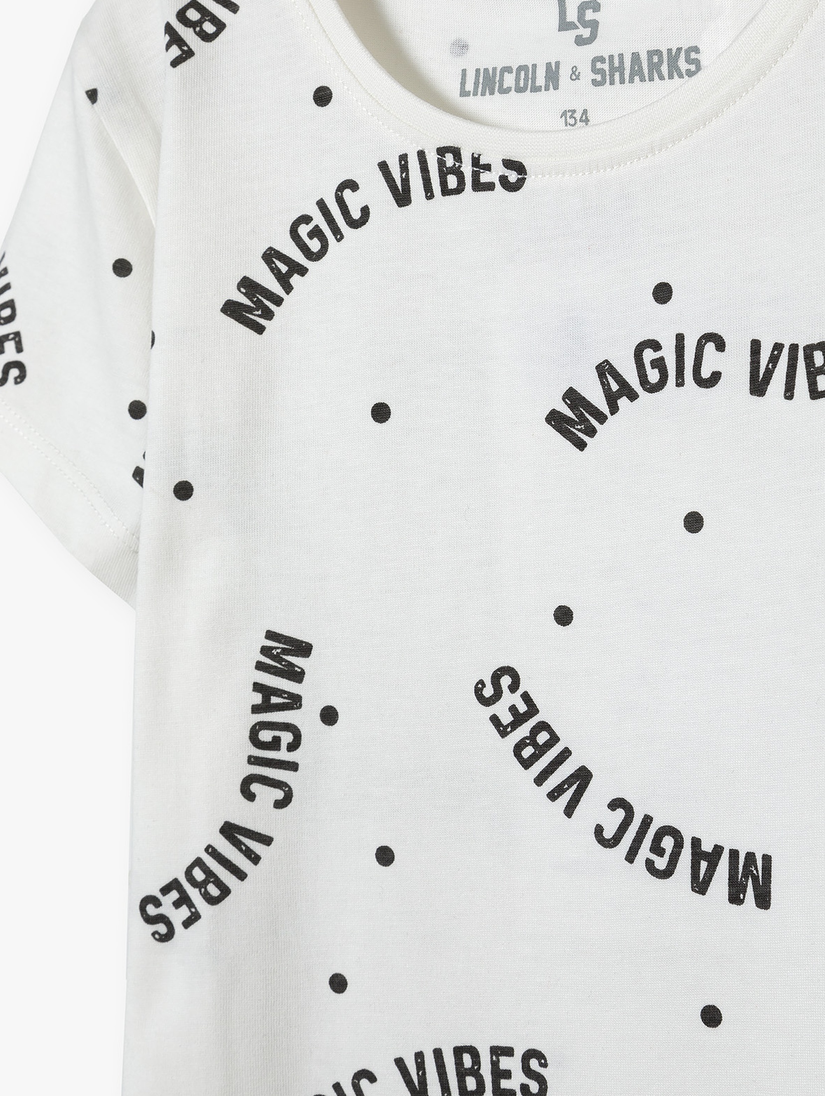 Kremowy t-shirt bawełniany dla dziewczynki z napisami Magic Vibes