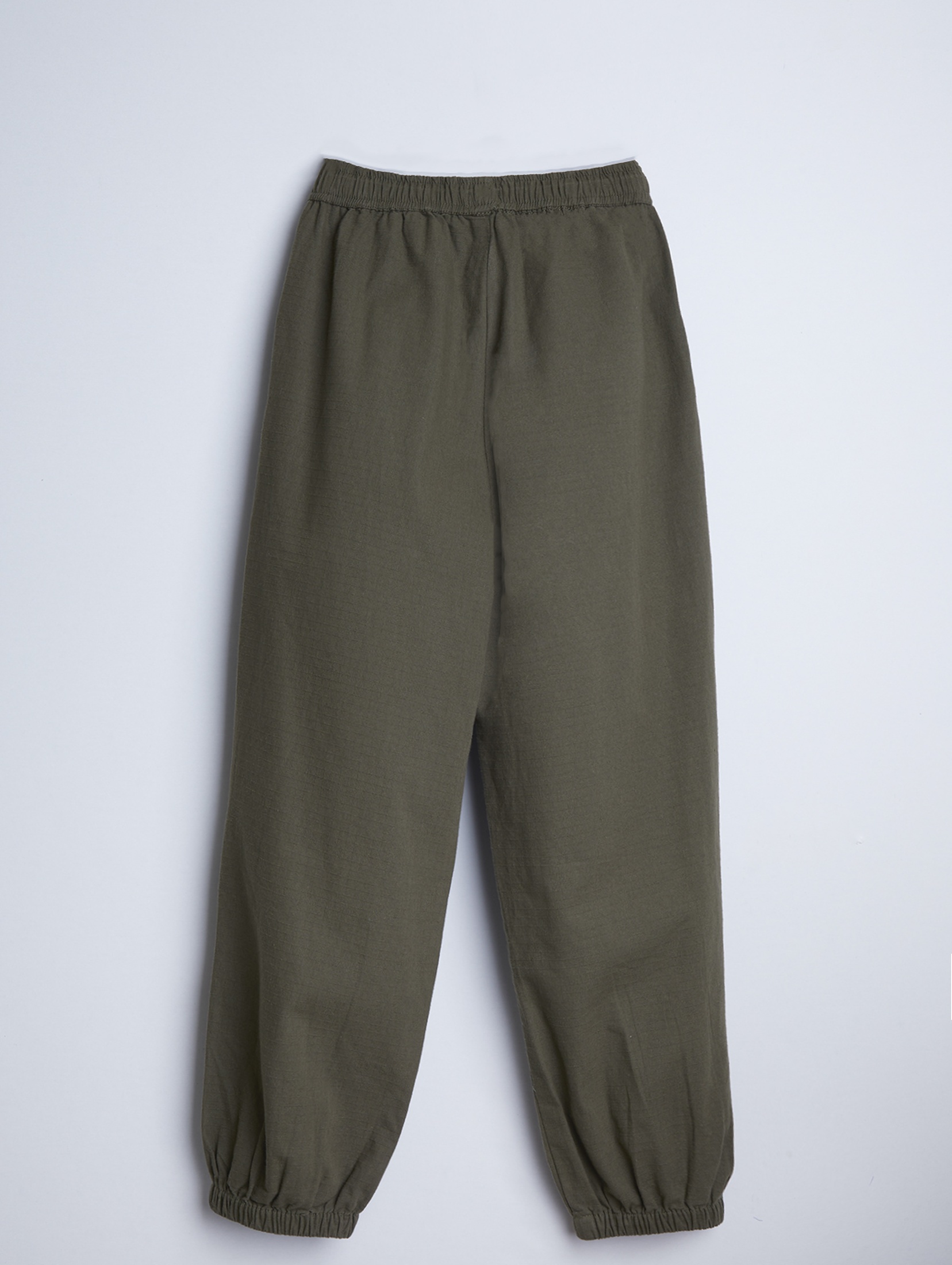 Zielone spodnie młodzieżowe - joggery - unisex - 
Limited Edition