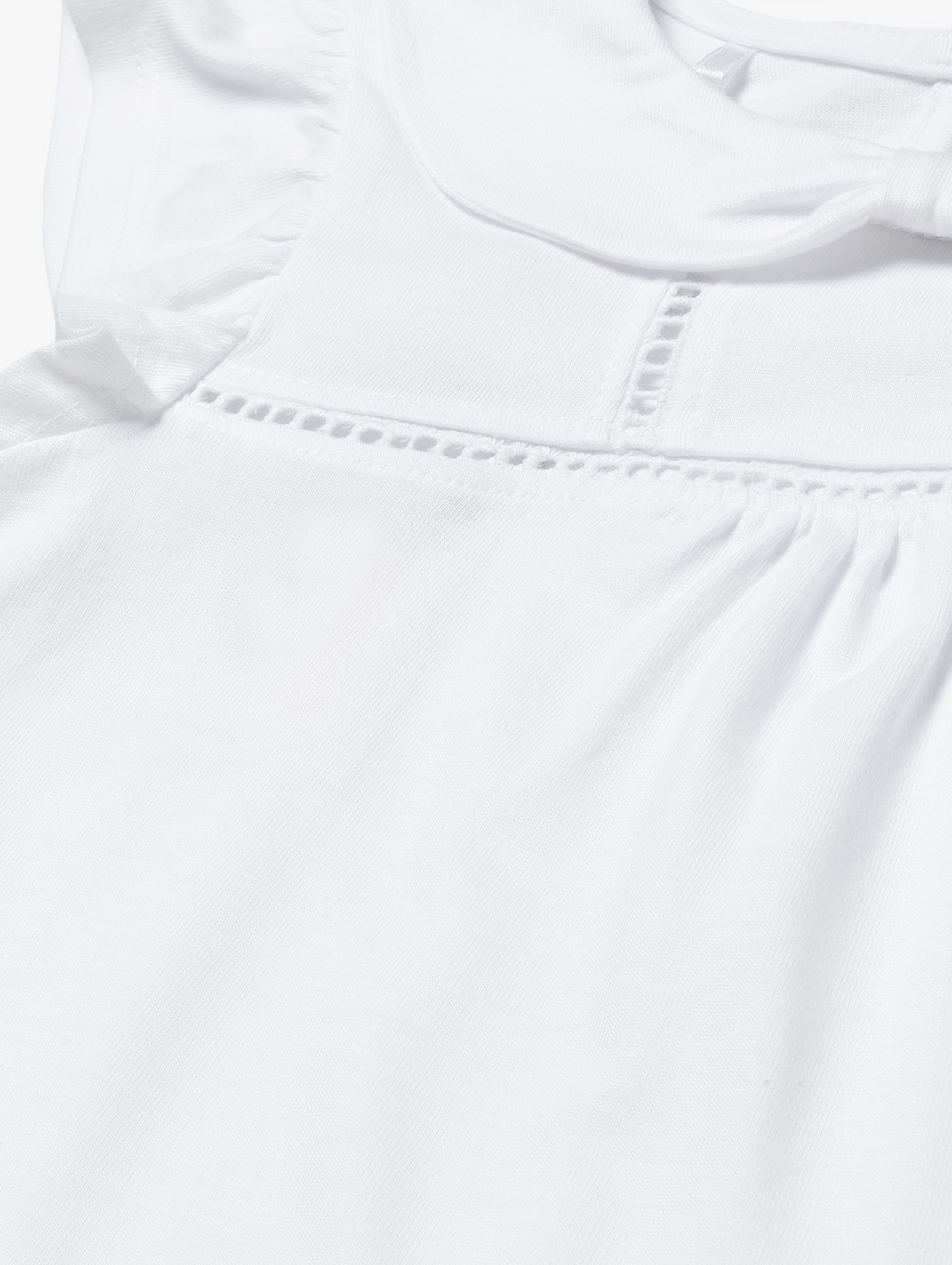Biała elegancka bluzka dziewczęca z kołnierzykiem