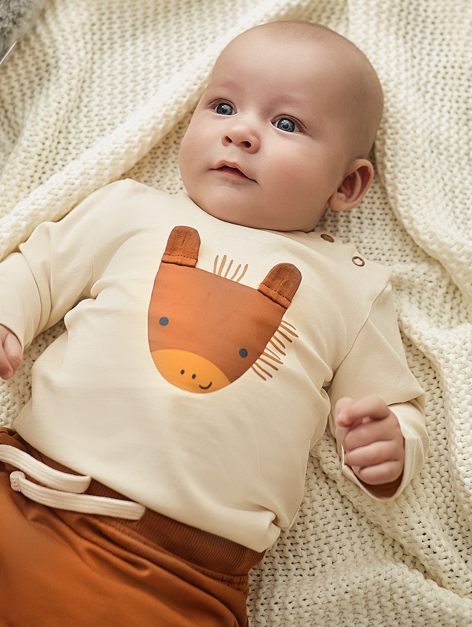 Bawełniana bluzka niemowlęca z długim rękawem - beżowa z konikiem