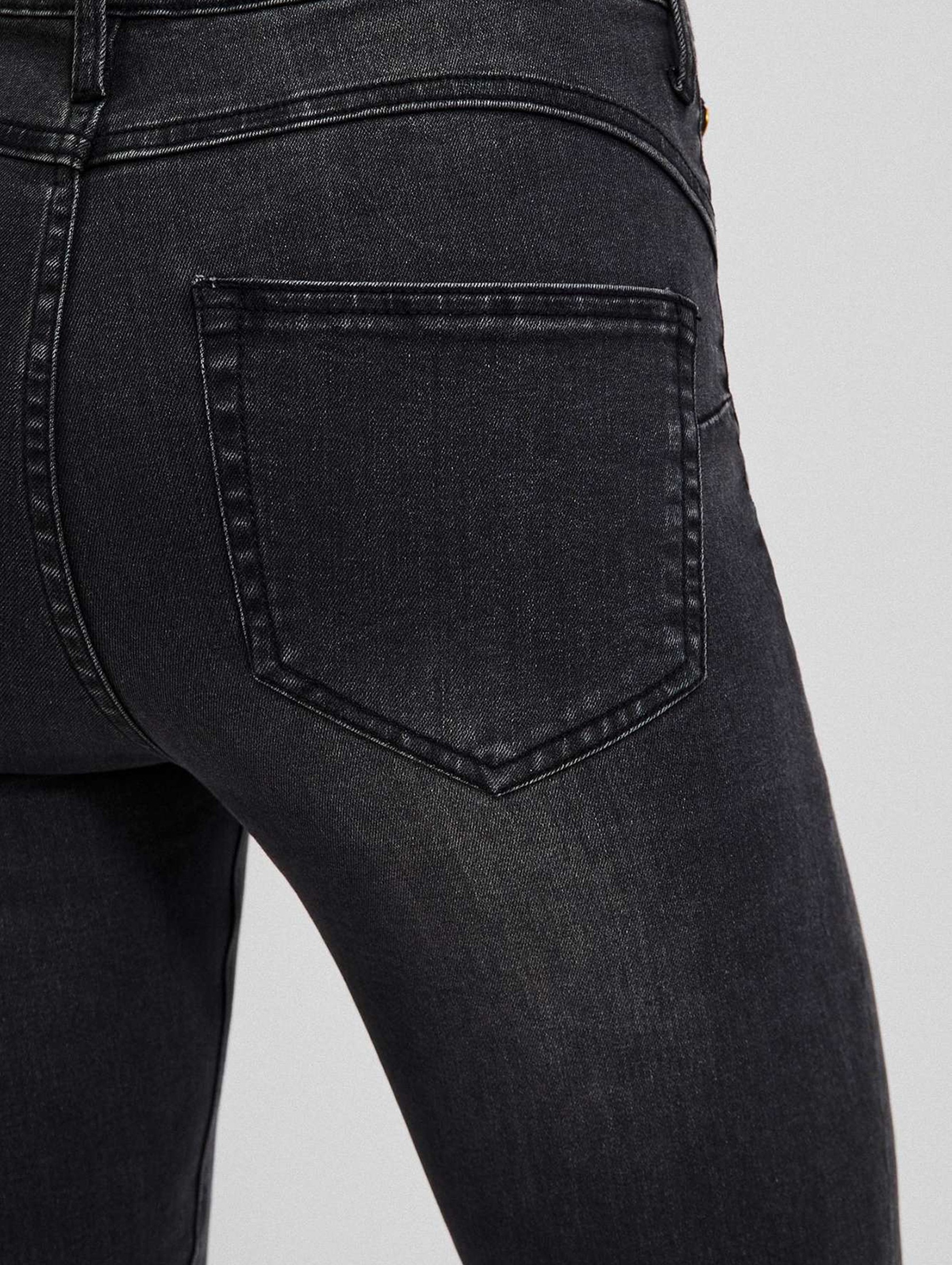 Szare spodnie damskie jeansowe rurki z przetarciami