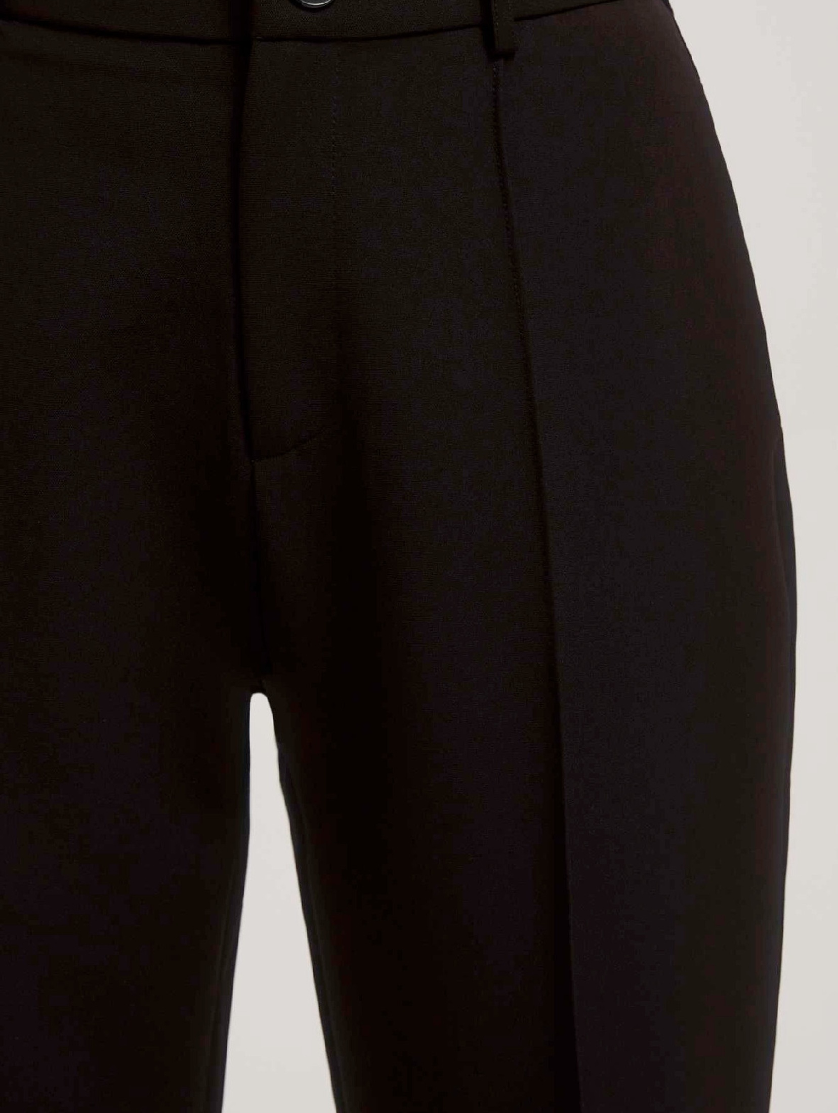 Eleganckie czarne spodnie damskie w kant