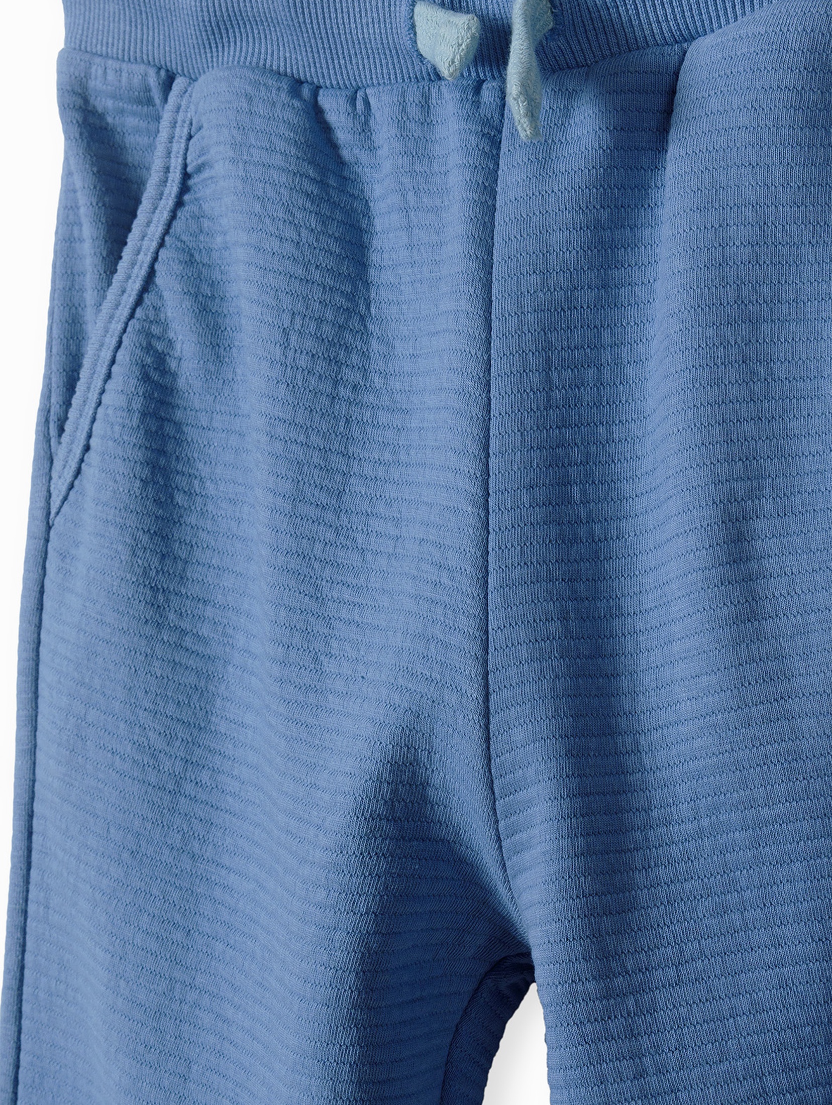 Wygodne spodnie dresowe dla chłopca z bawełny- niebieskie
