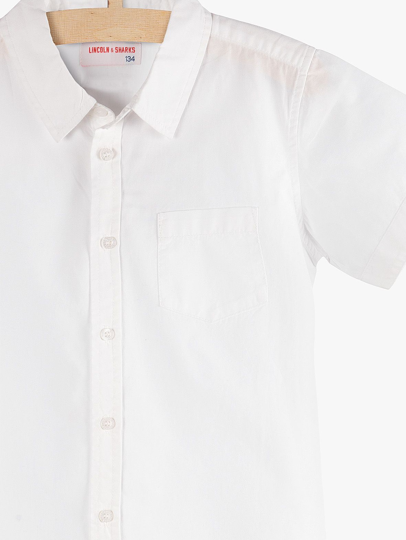 Elegancka biała koszula dla chłopca