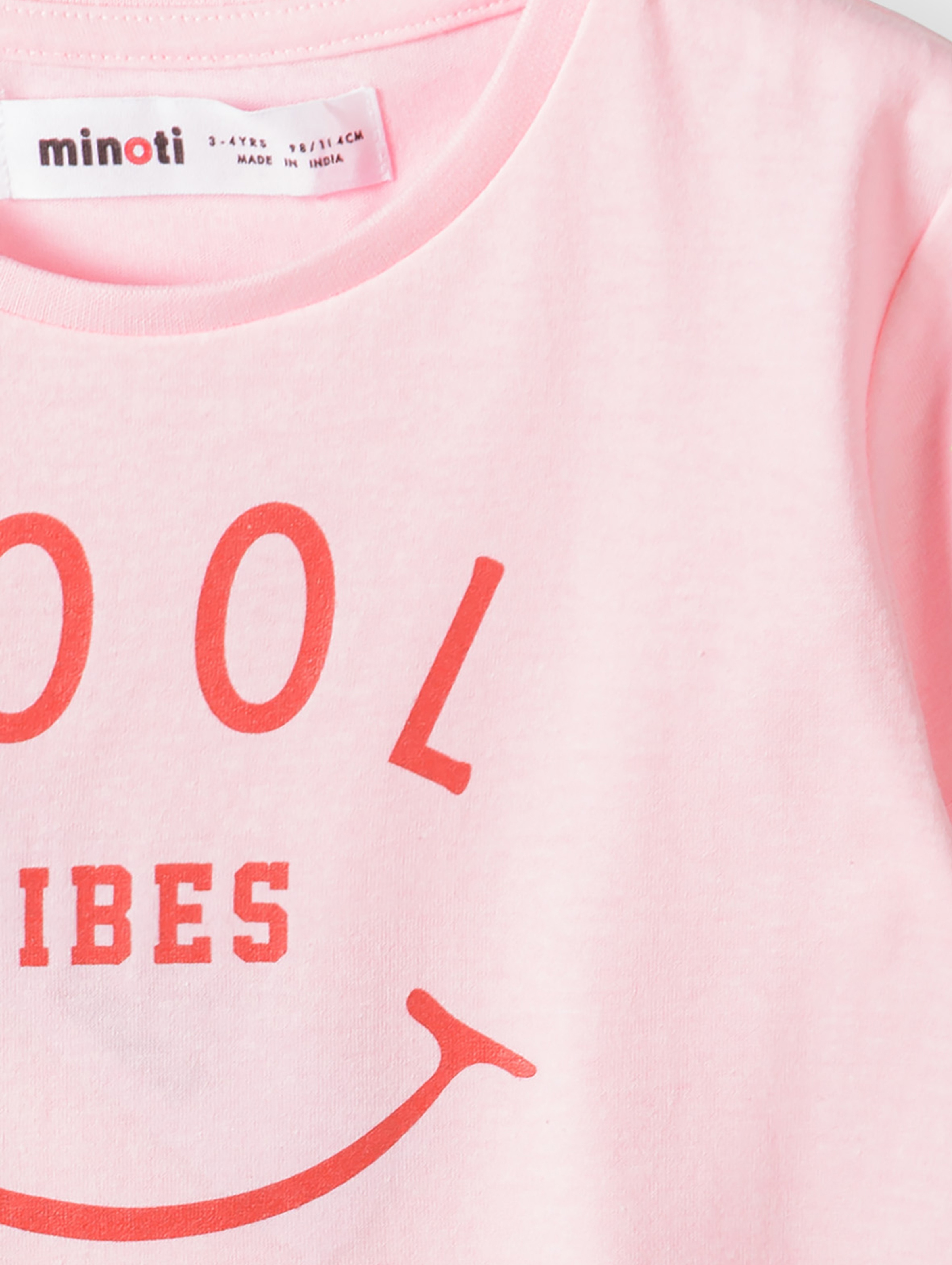 Różowa koszulka dzianinowa niemowlęca z wiązaniem