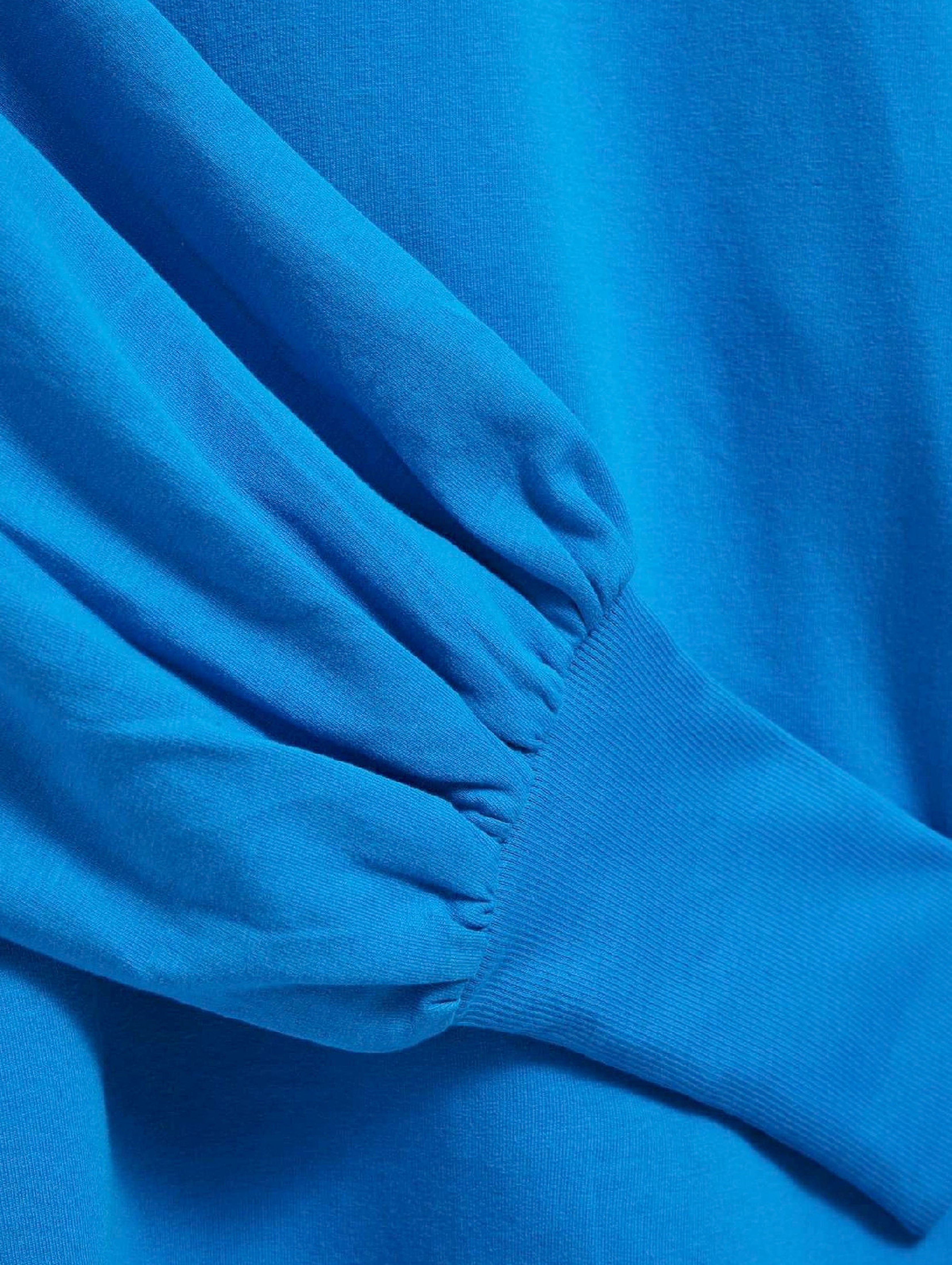 Niebieska damska bluza z bufiastymi rękawami