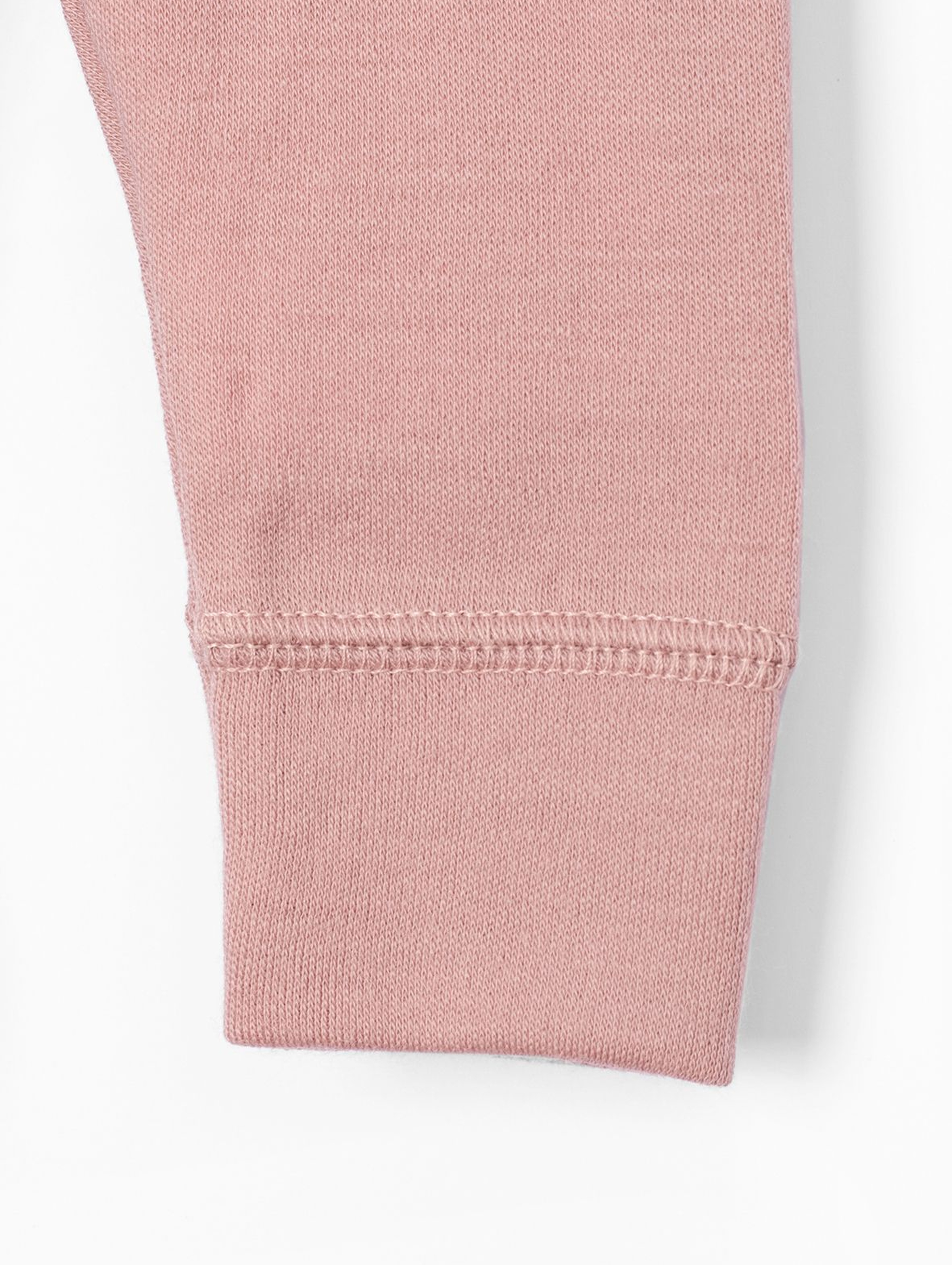 Wełniane różowe spodnie dresowe dla niemowlaka