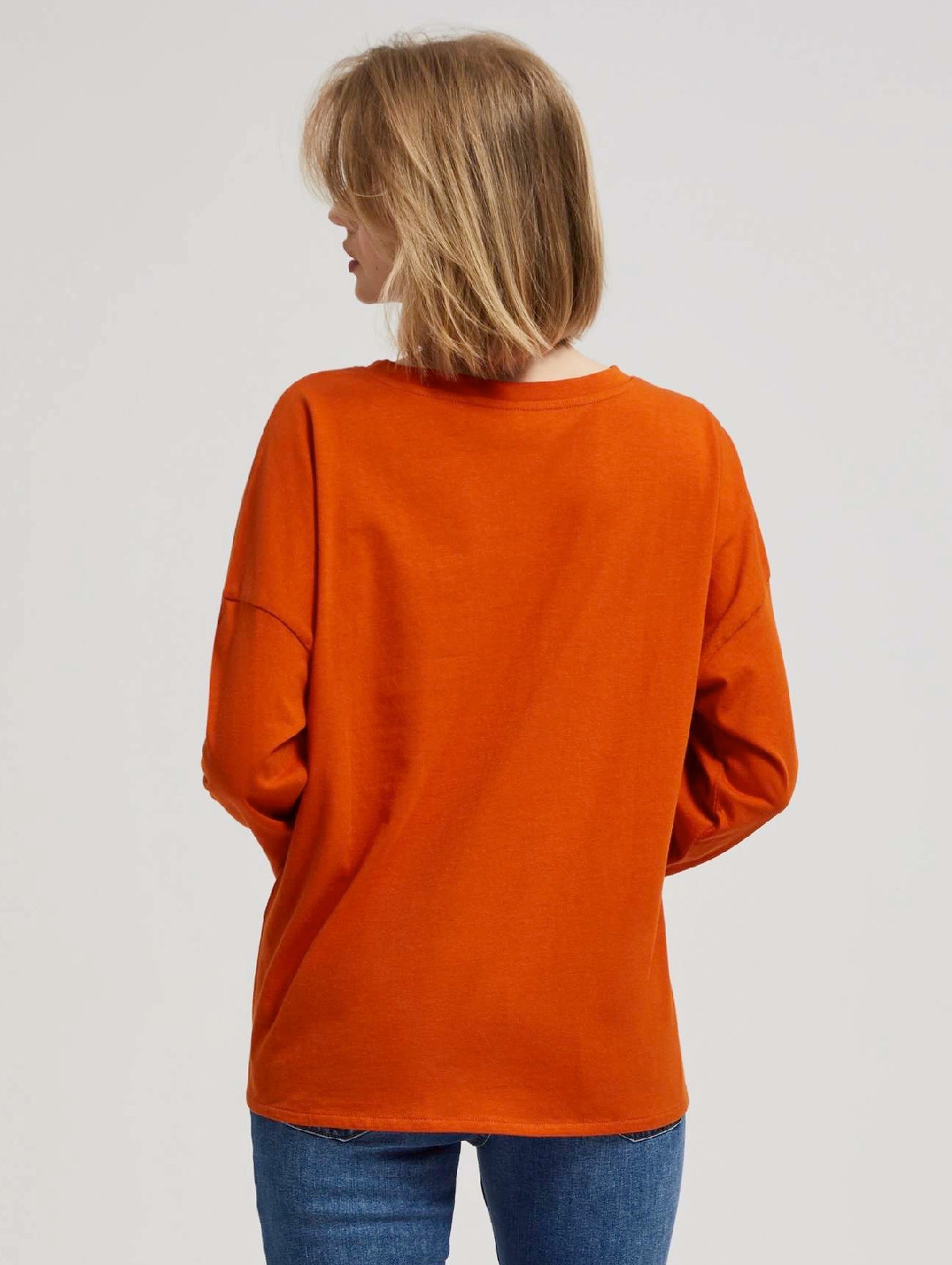 Damska bluzka pomarańczowa z długim rękawem i wiązaniem