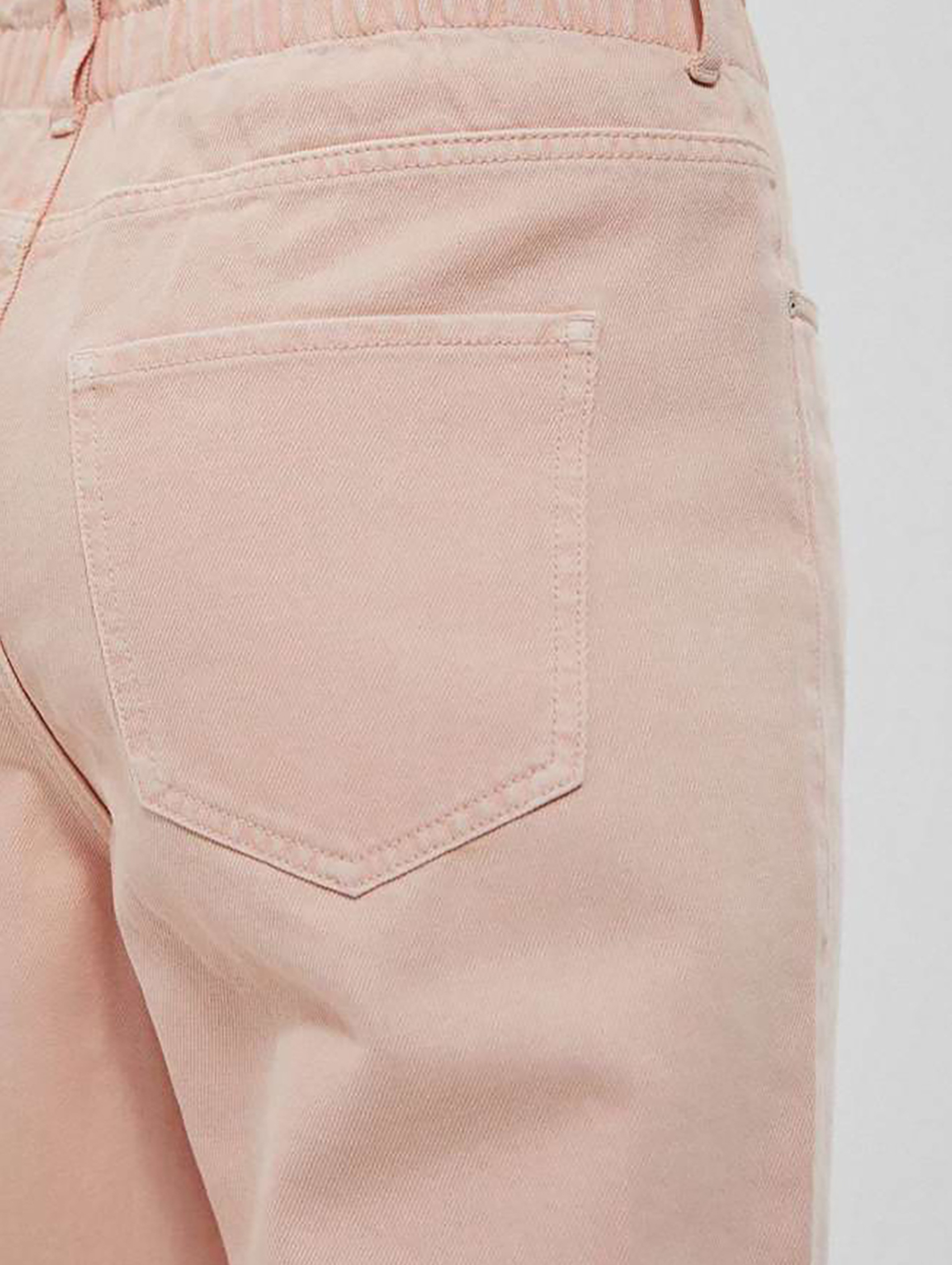 Bawełniane spodnie jeansowe damskie różowe