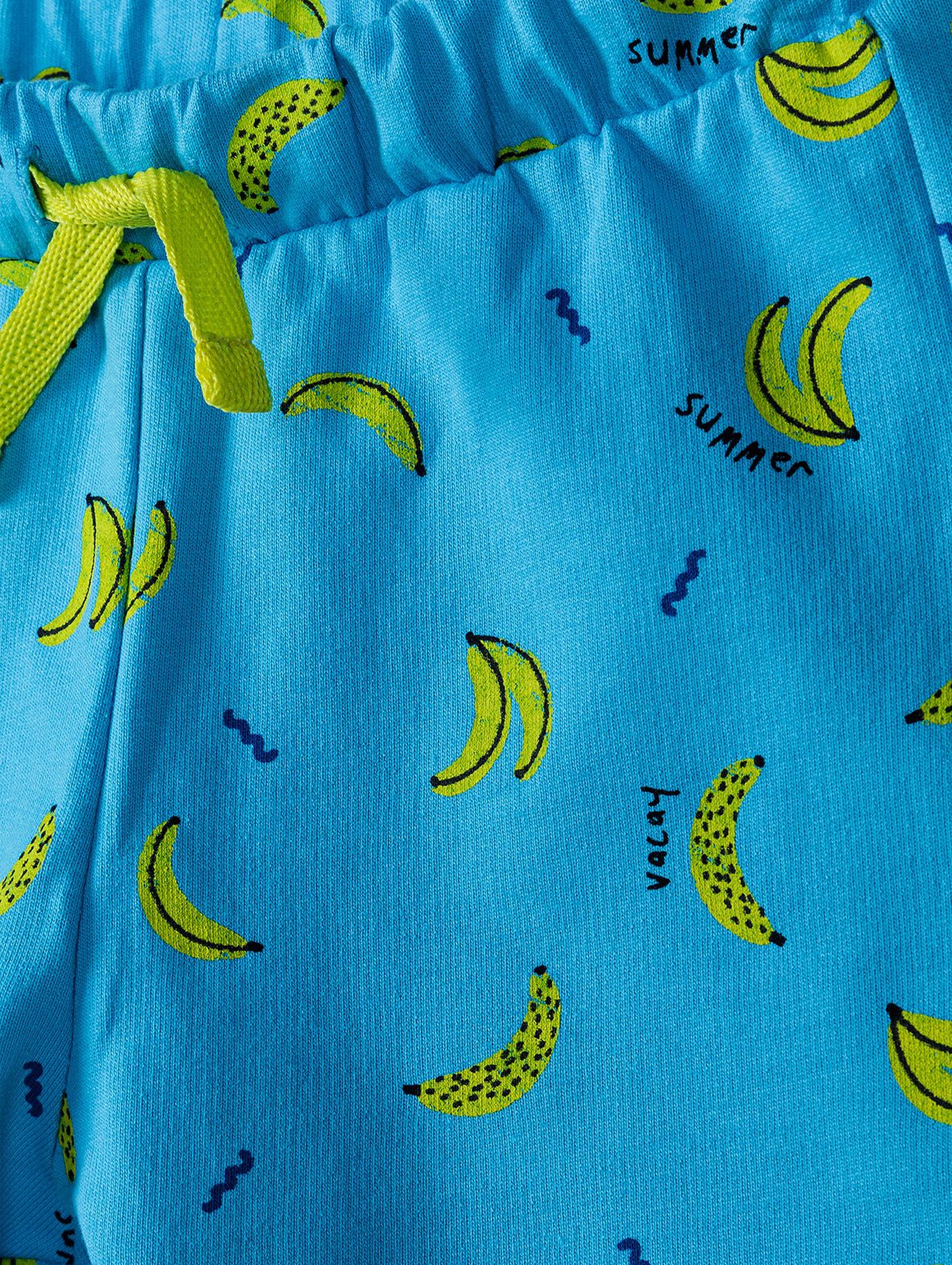 Dzianinowe szorty w banany dla niemowlaka - niebieskie w banany
