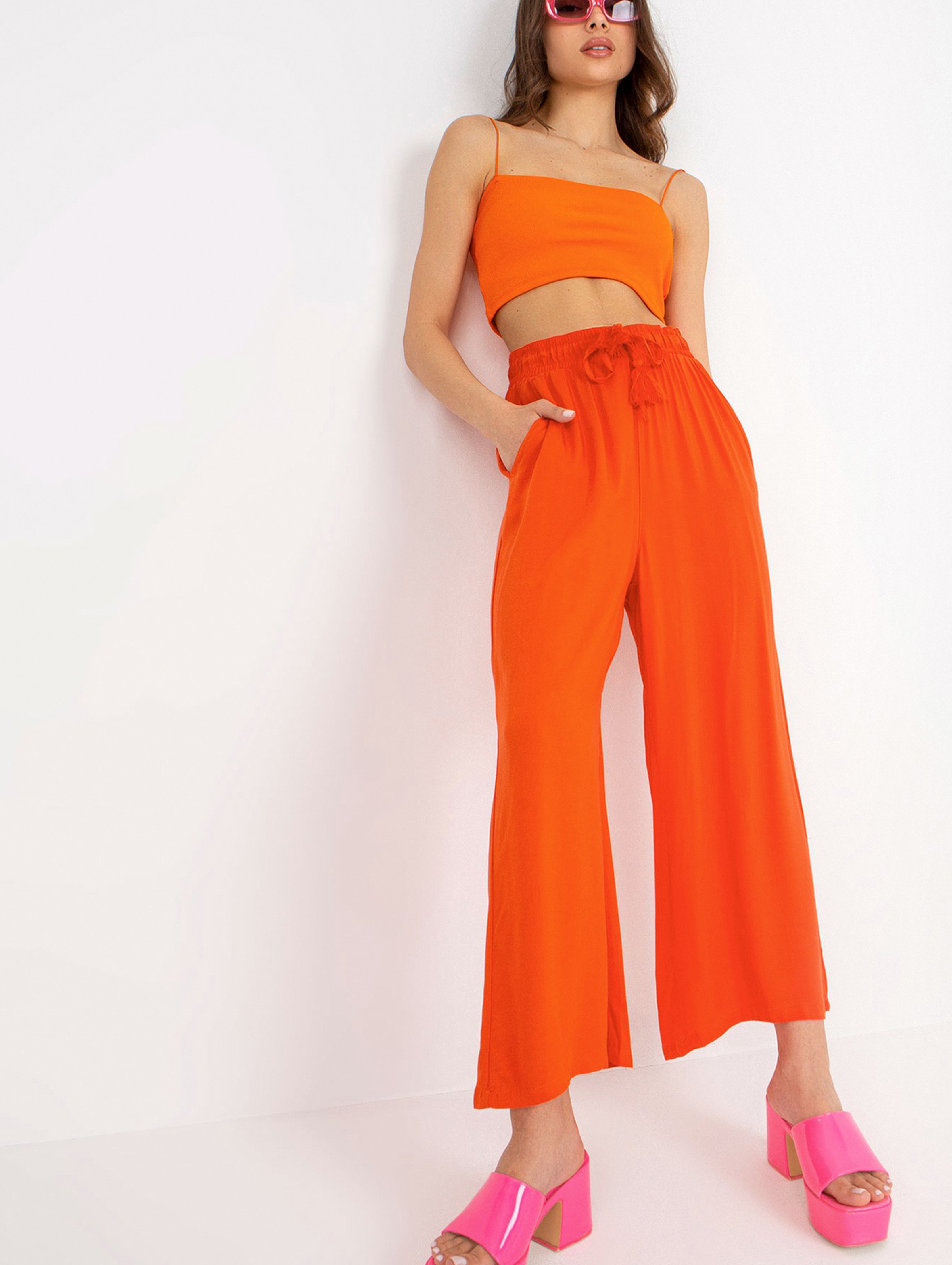 Pomarańczowe spodnie damskie z wiskozy SUBLEVEL