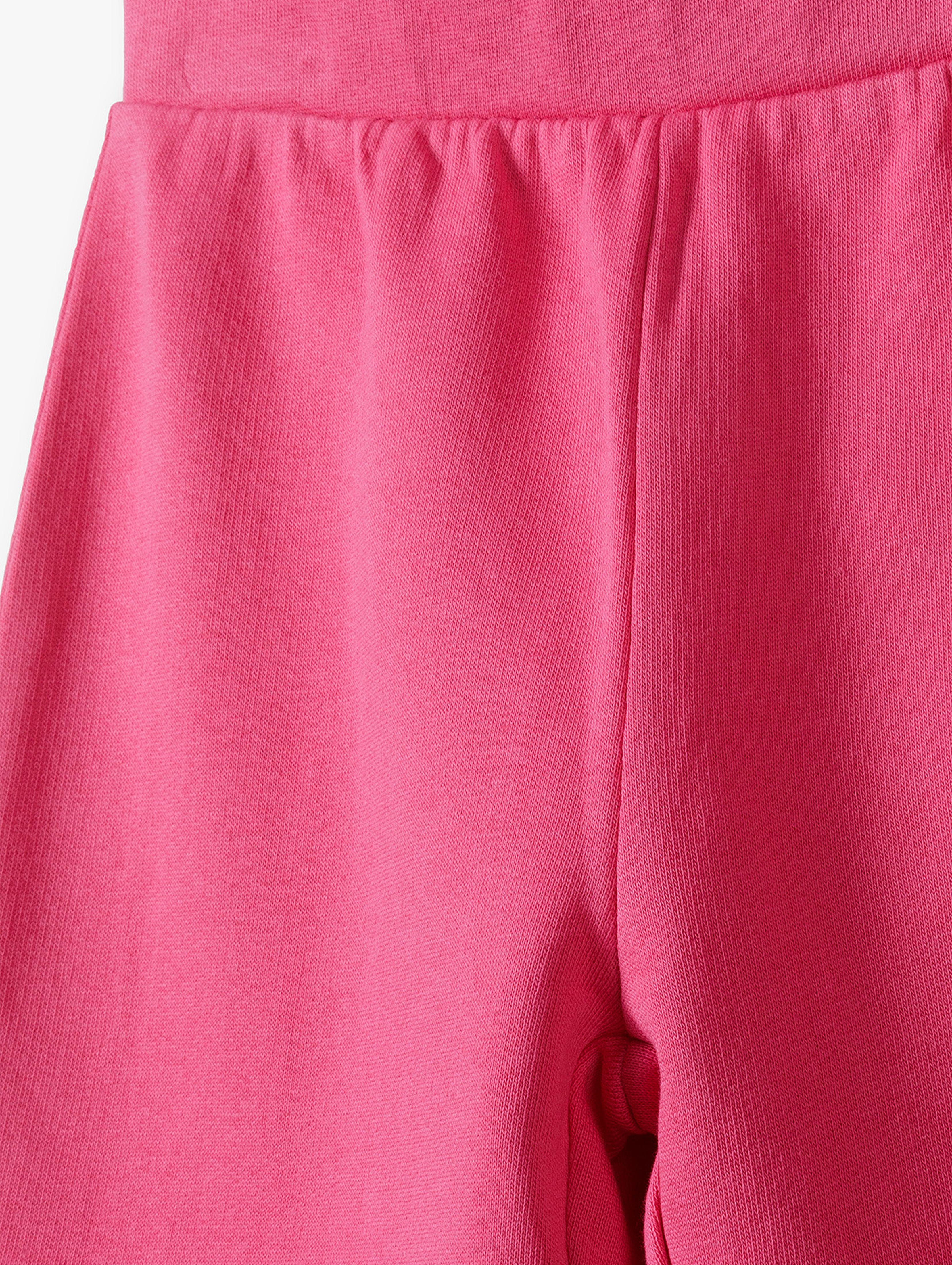 Spodnie dziewczęce flare - różowe w prążki - Limited Edition