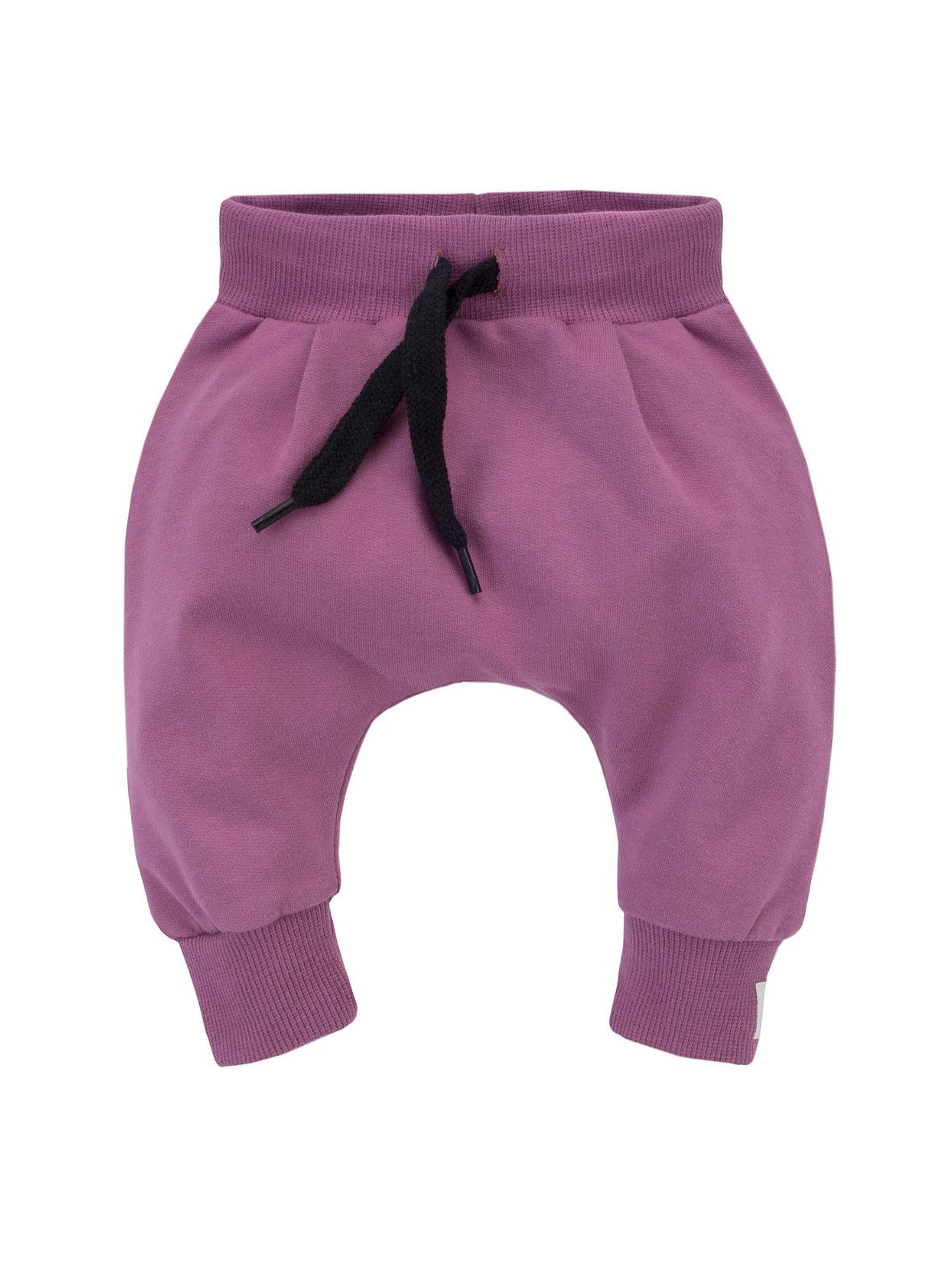 Dziewczęce spodnie pumpy z różowej dresówki