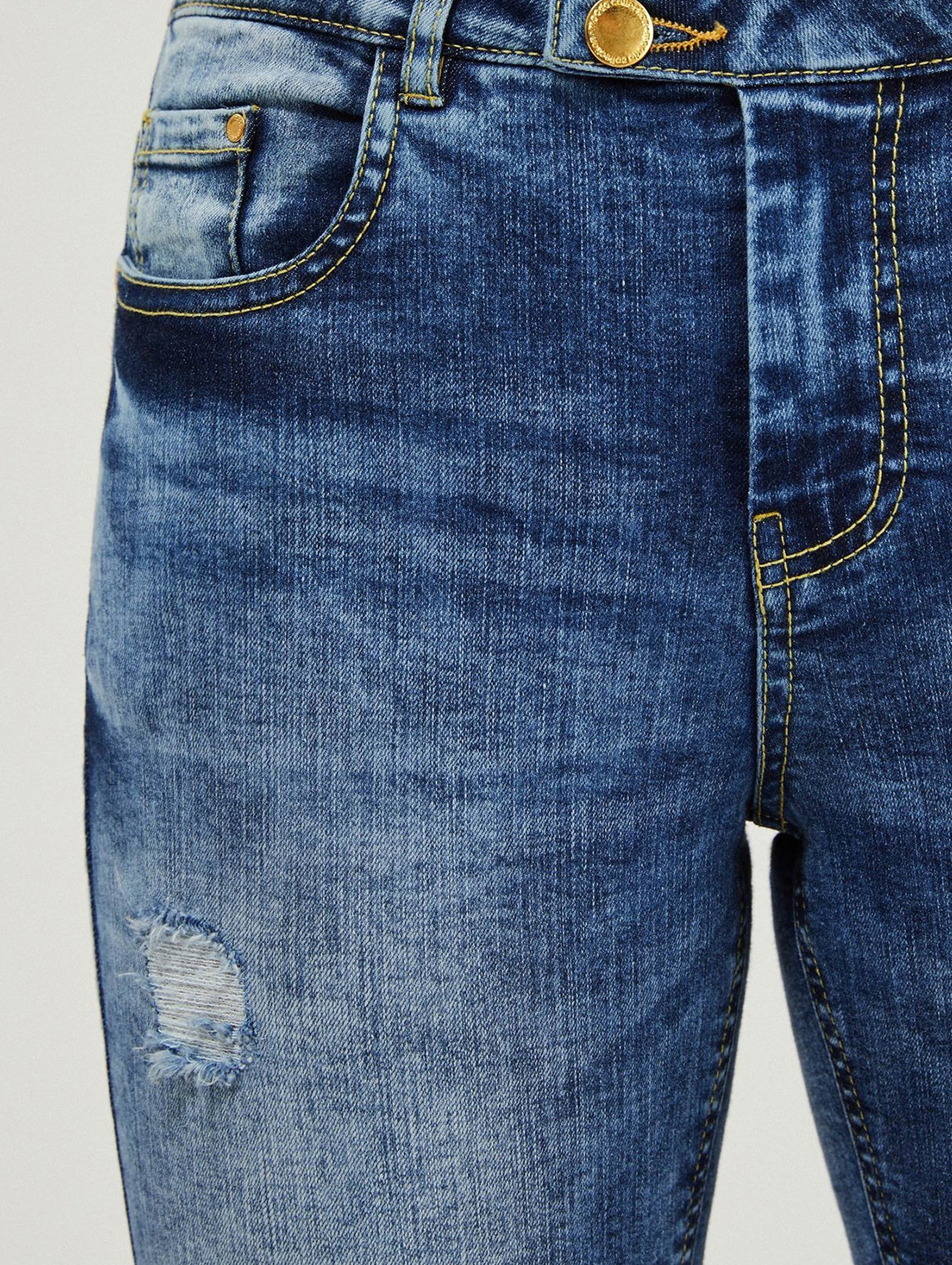 Spodnie jeansy z efektem sprania