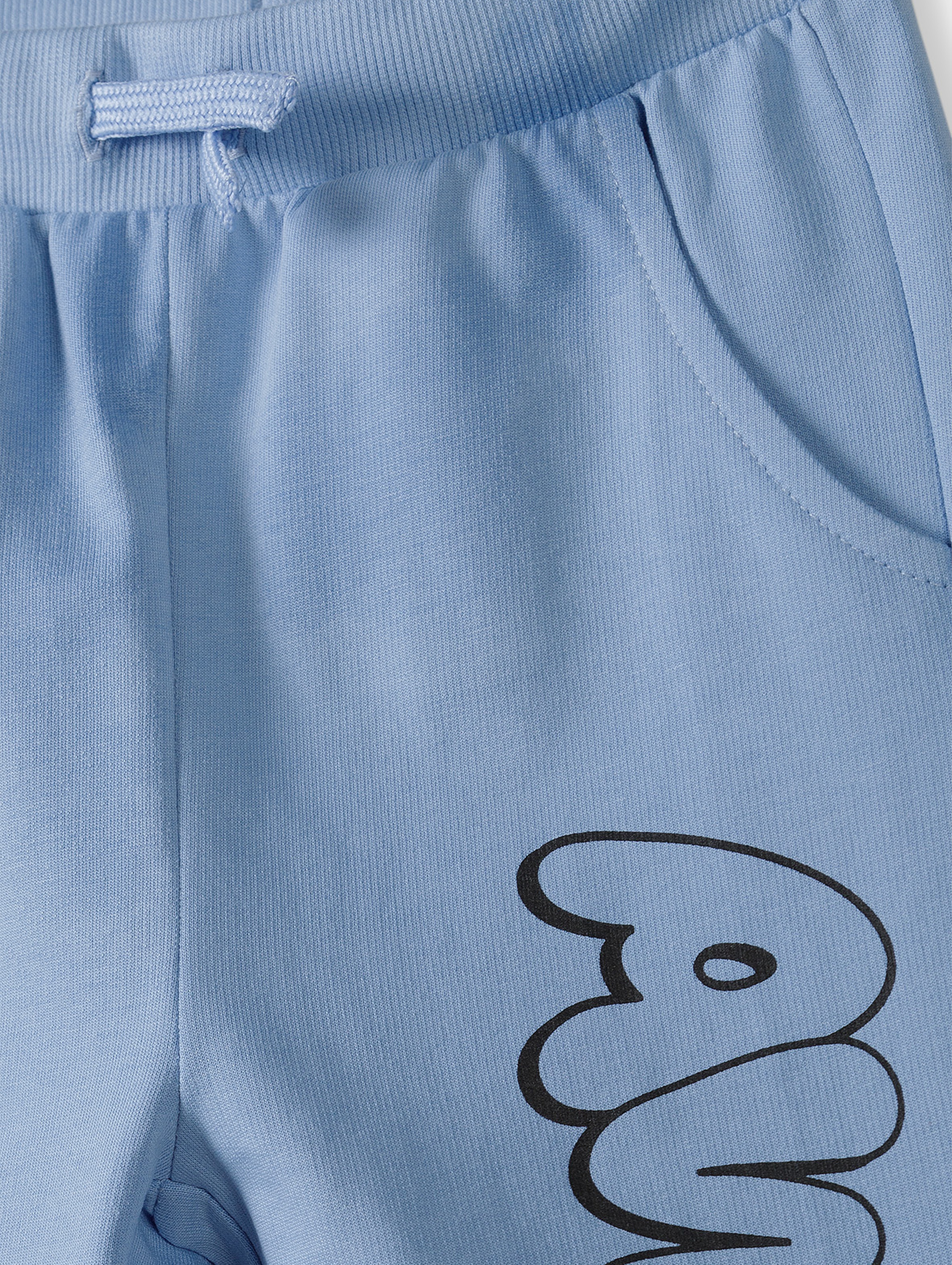 Dresowe spodnie slim dla chłopca - niebieskie z napisem Awesome - 5.10.15.