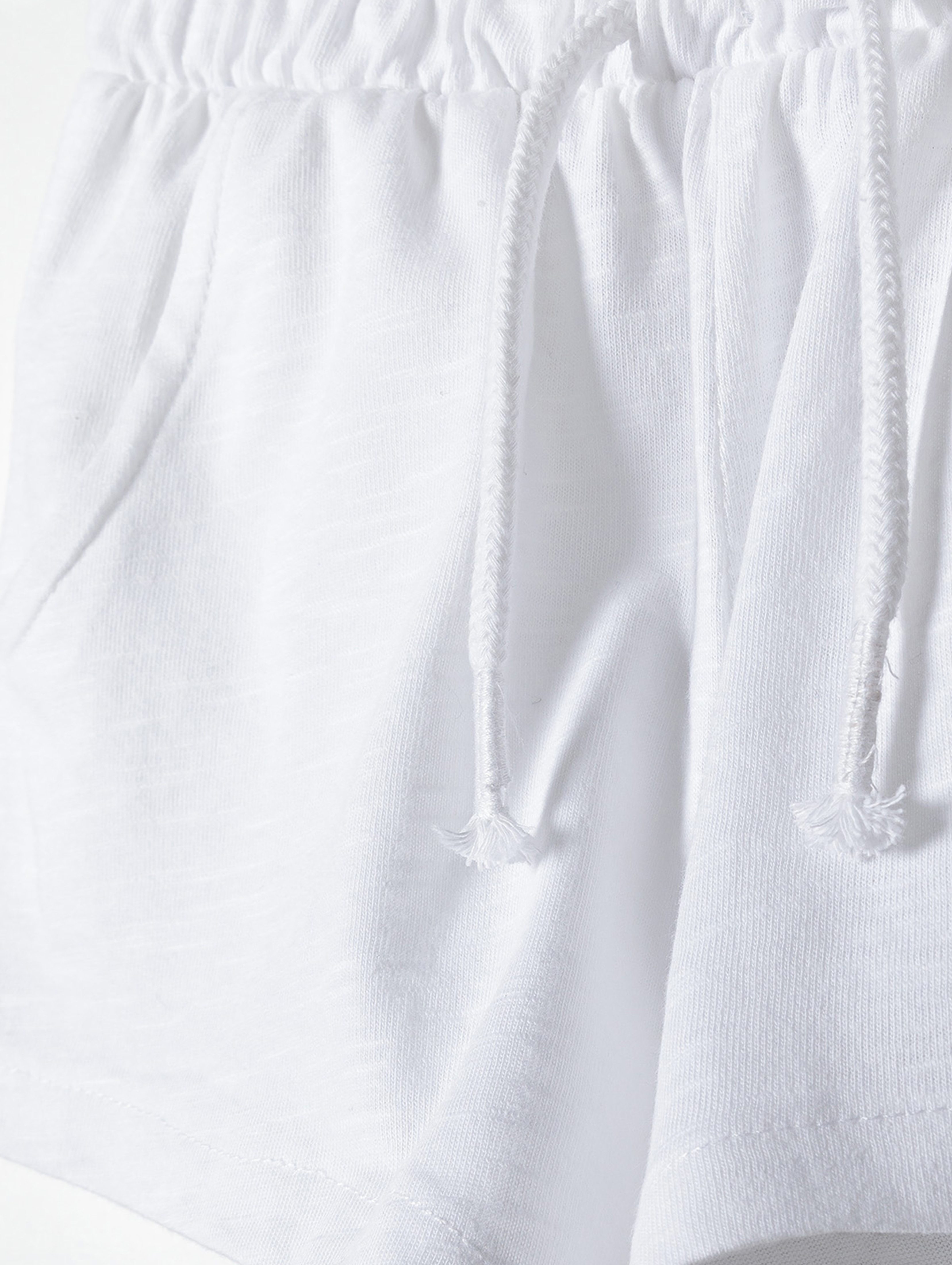 Białe szorty dresowe dla niemowlaka z bawełny