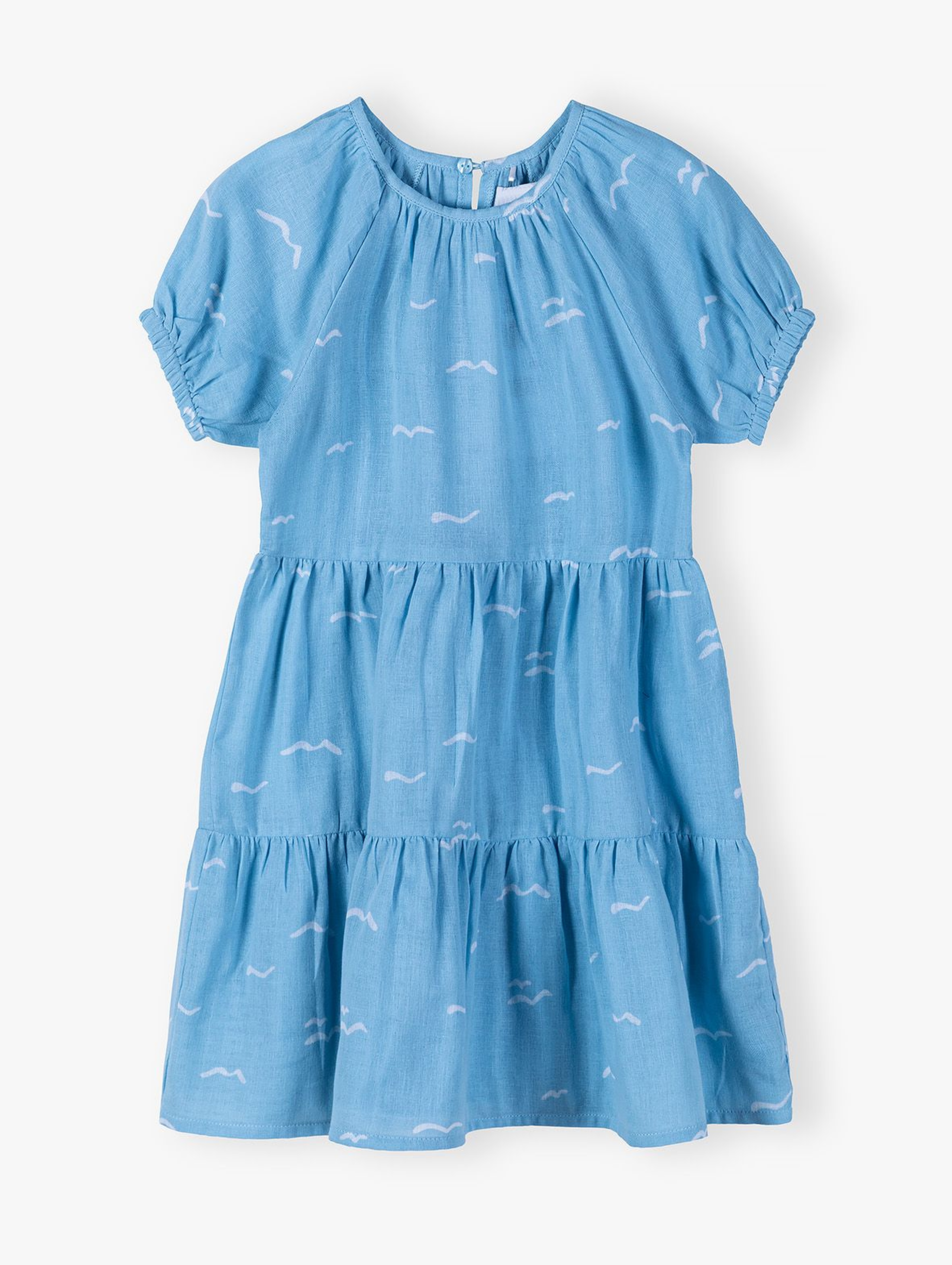 Błękitna sukienka we wzory dla dziewczynki