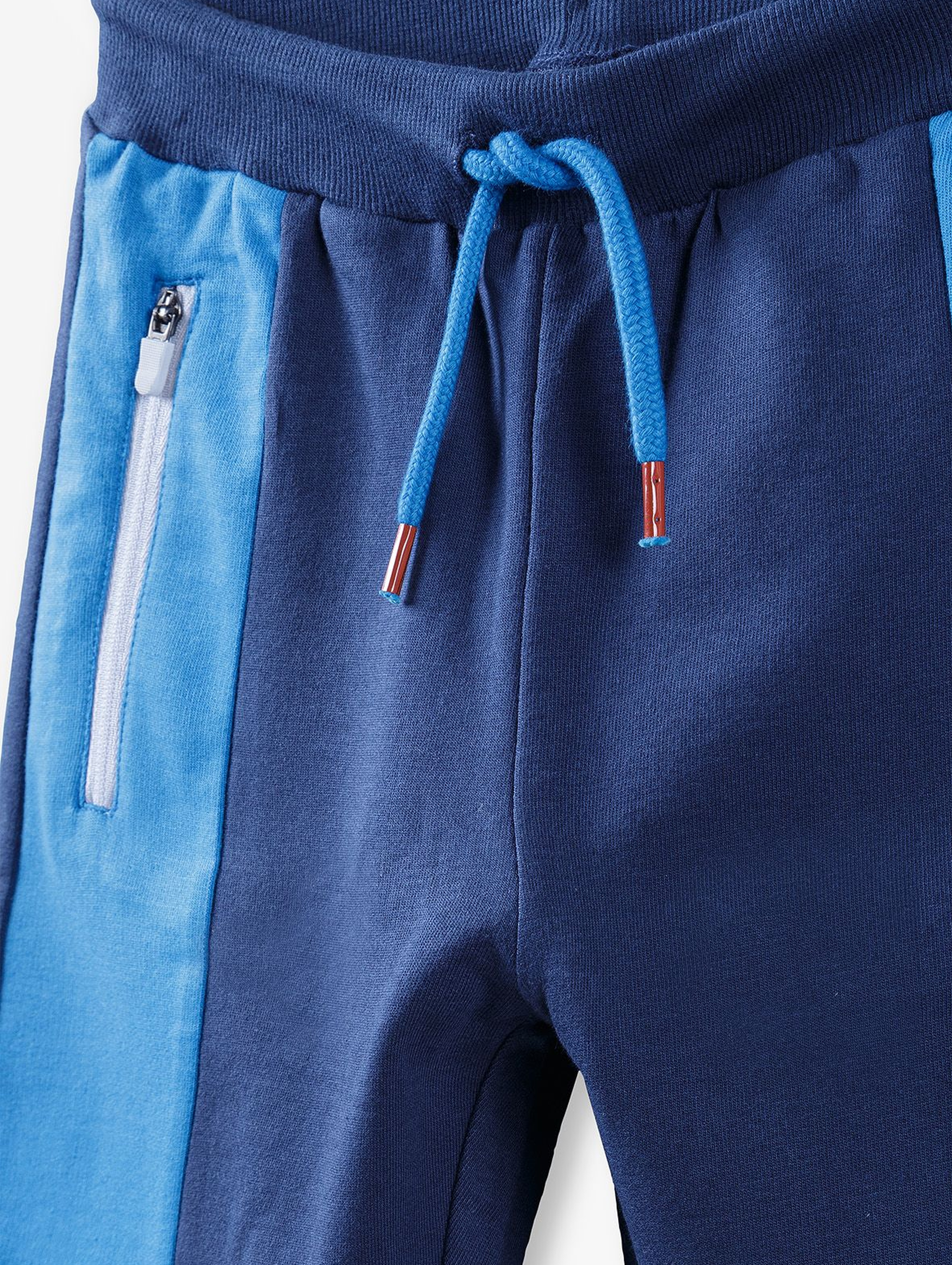 Spodnie dresowe chłopięce - granatowe z niebieskimi wstawkami