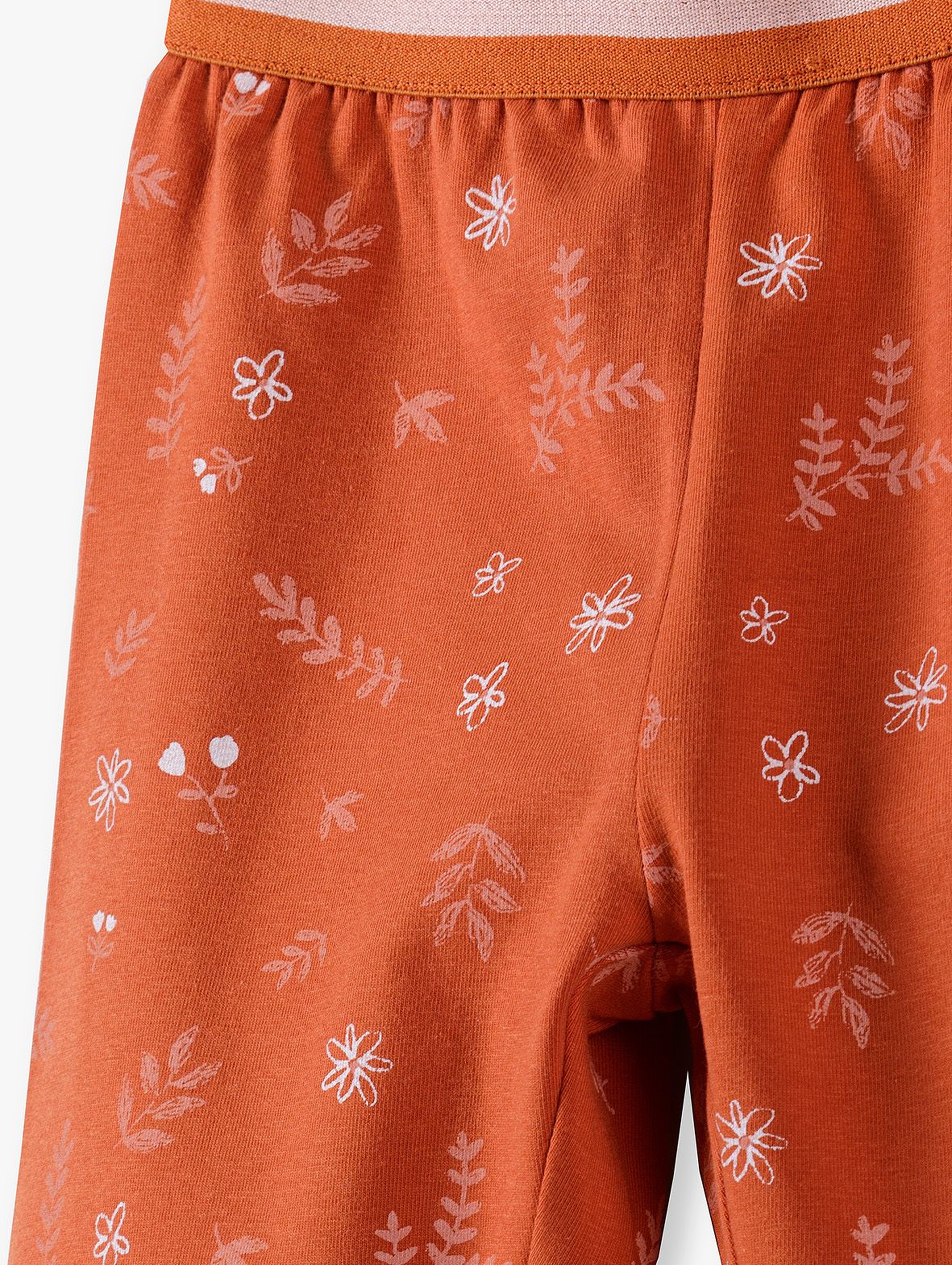 Pomarańczowe legginsy dziewczęce w liście