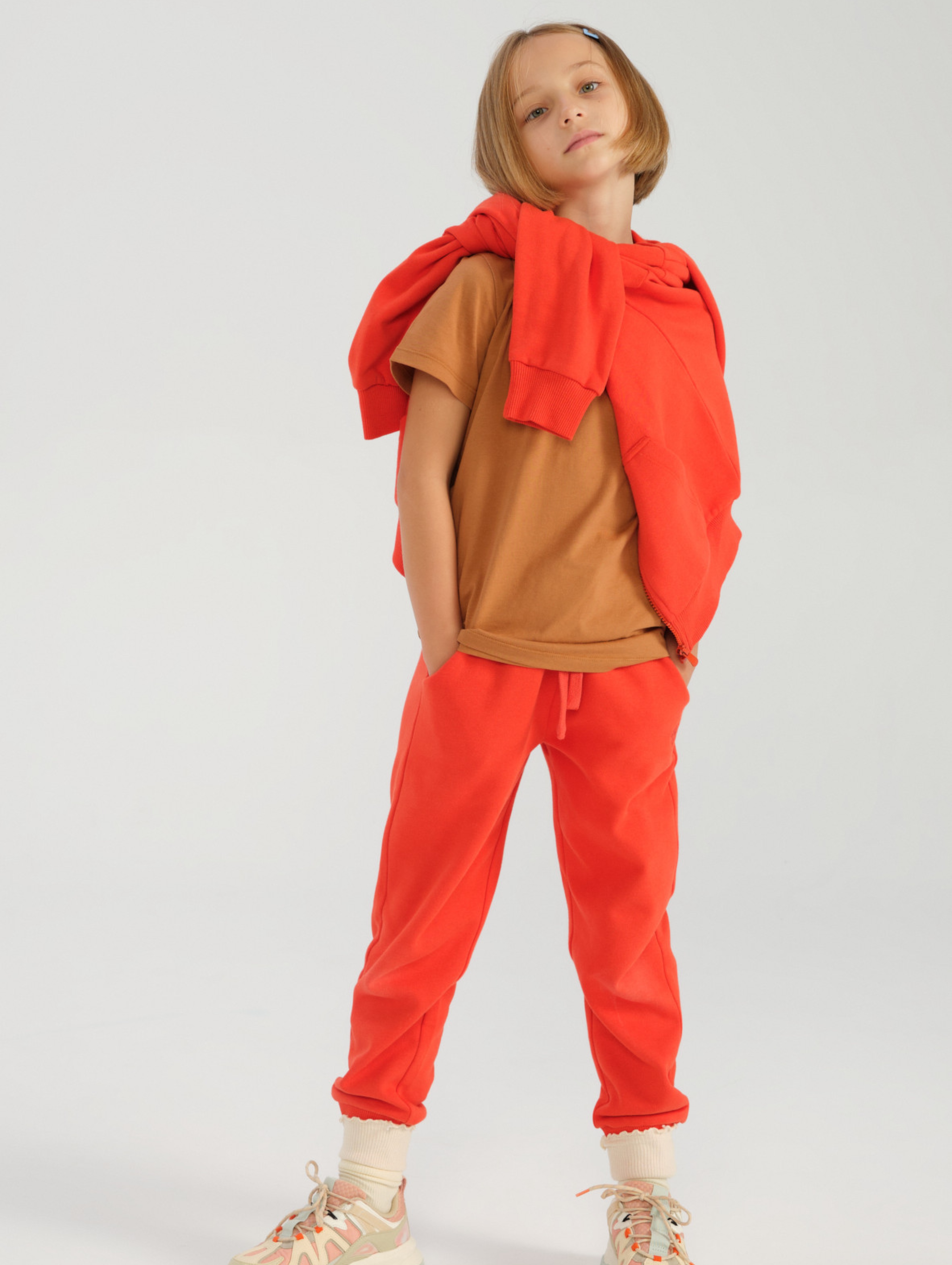 Pomarańczowe spodnie dresowe dla dziecka - unisex - Limited Edition