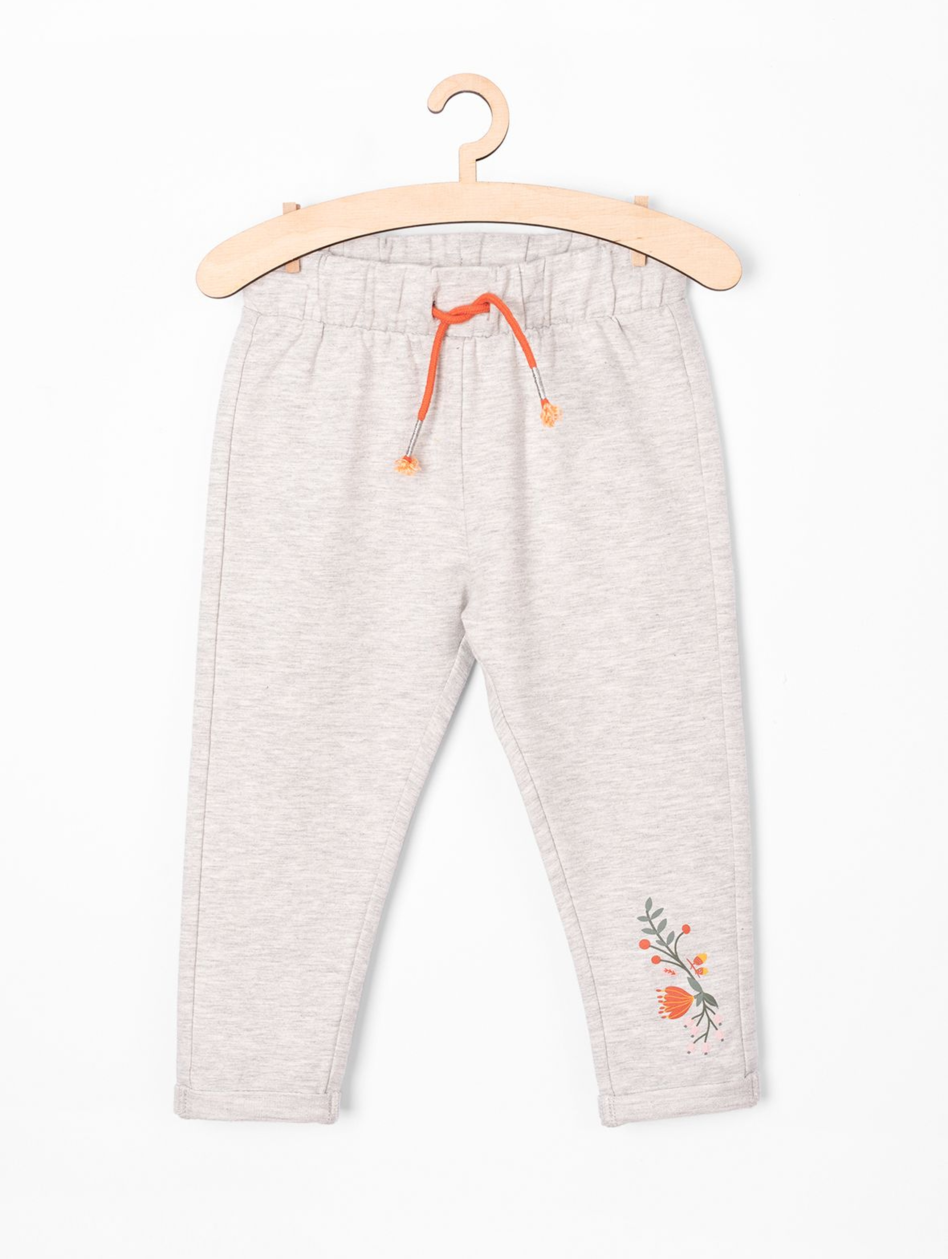 Spodnie dresowe niemowlęce - szare z kwiatkiem